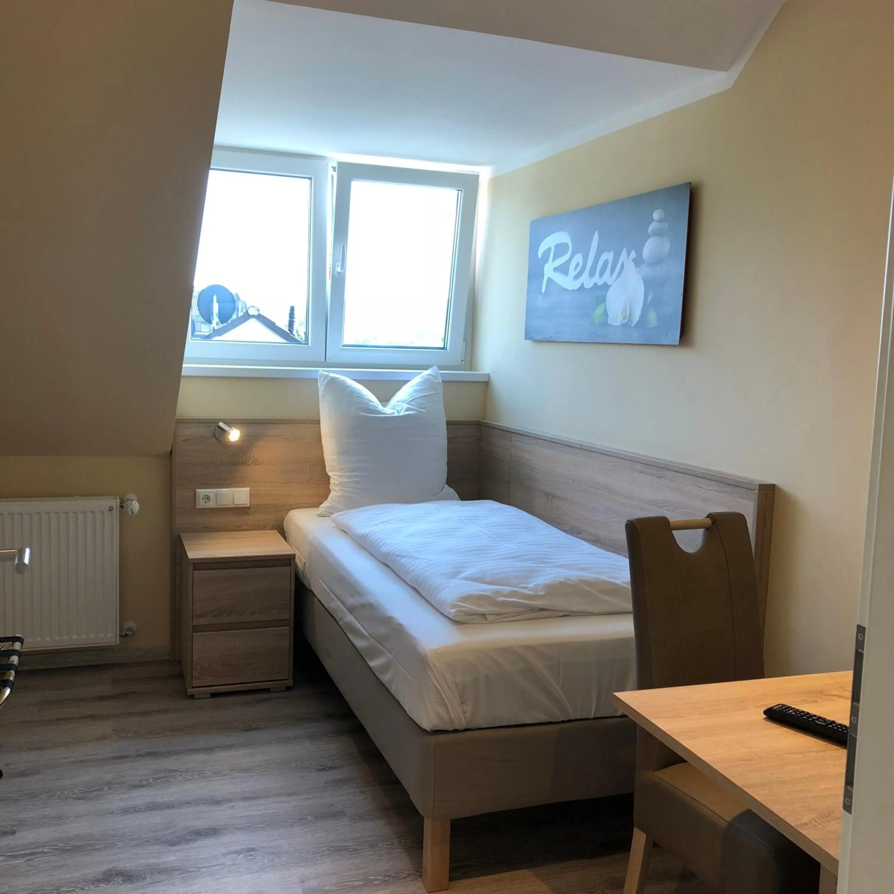 Bed in Hotel Select Suites & Aparts