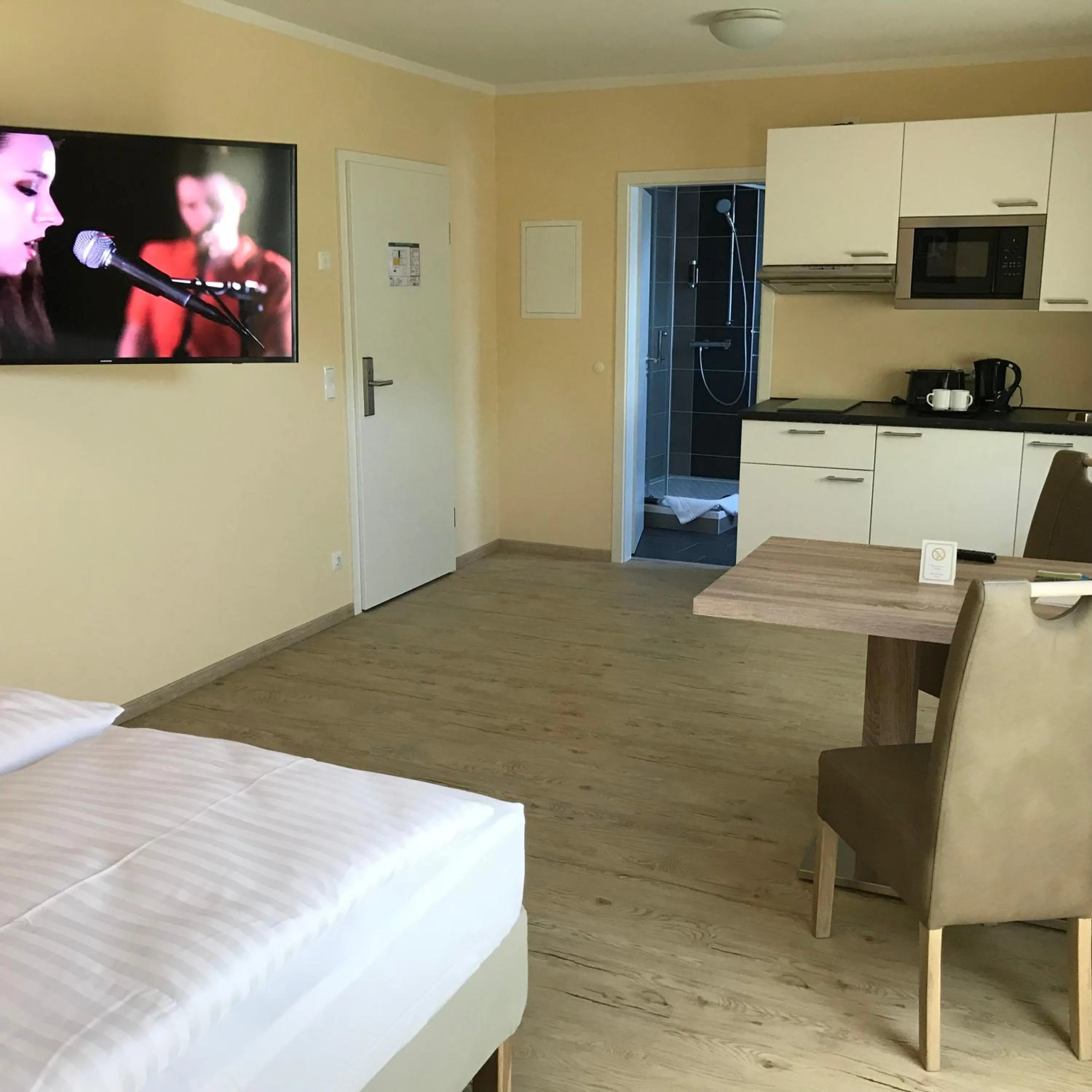 Bed in Hotel Select Suites & Aparts