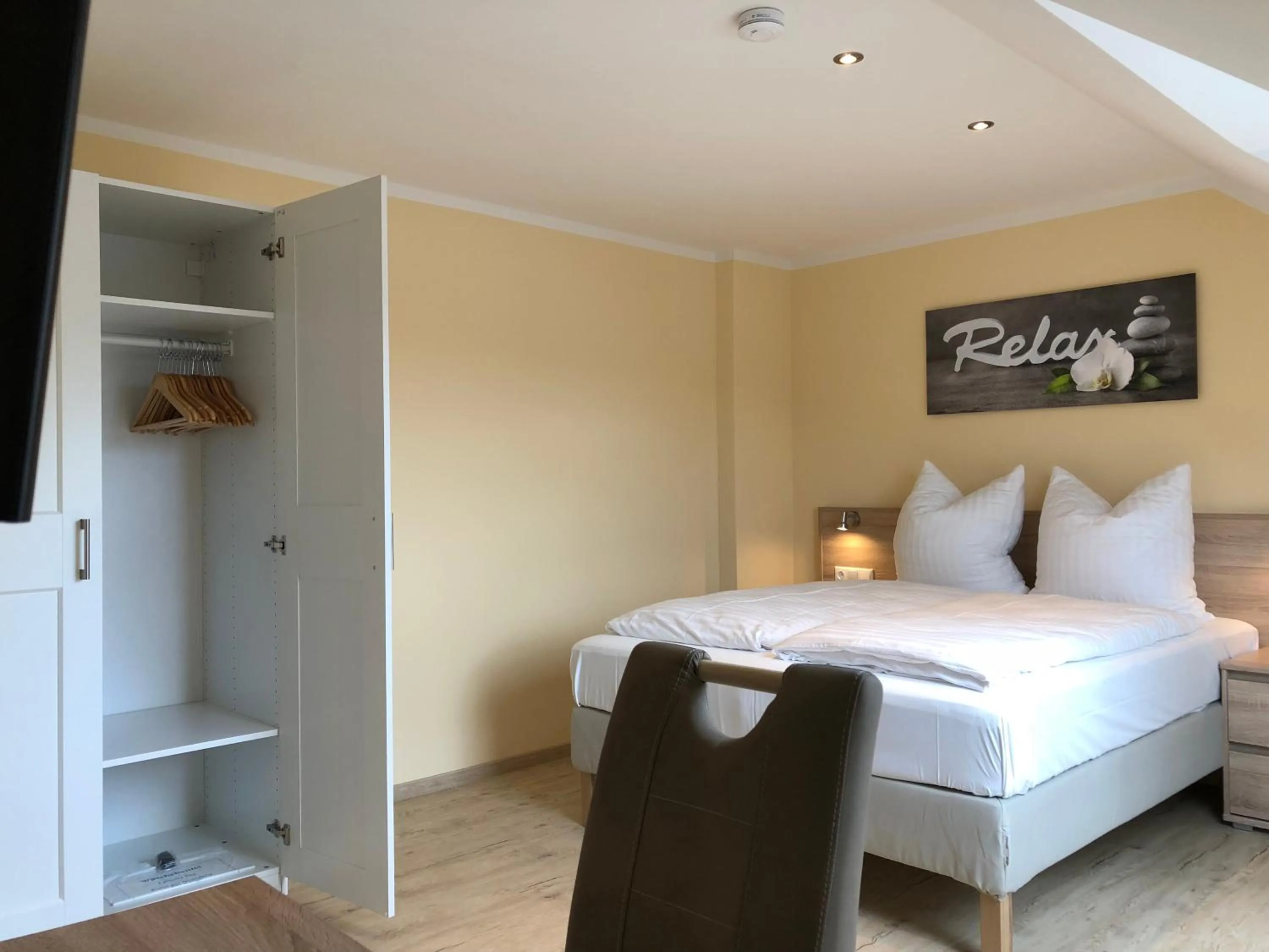 Bed in Hotel Select Suites & Aparts