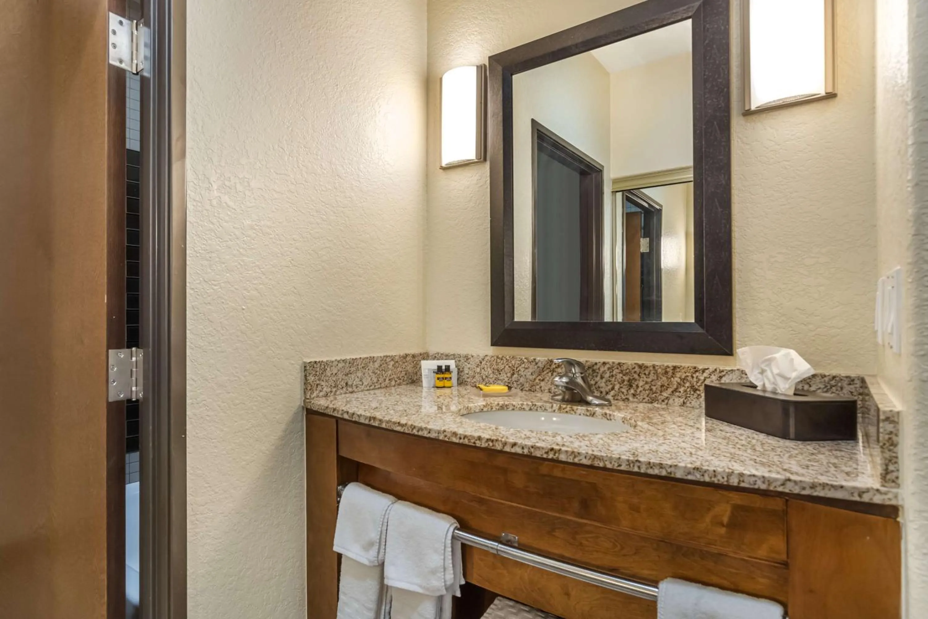 Bathroom in Best Western Plus Lackland Hotel and Suites.