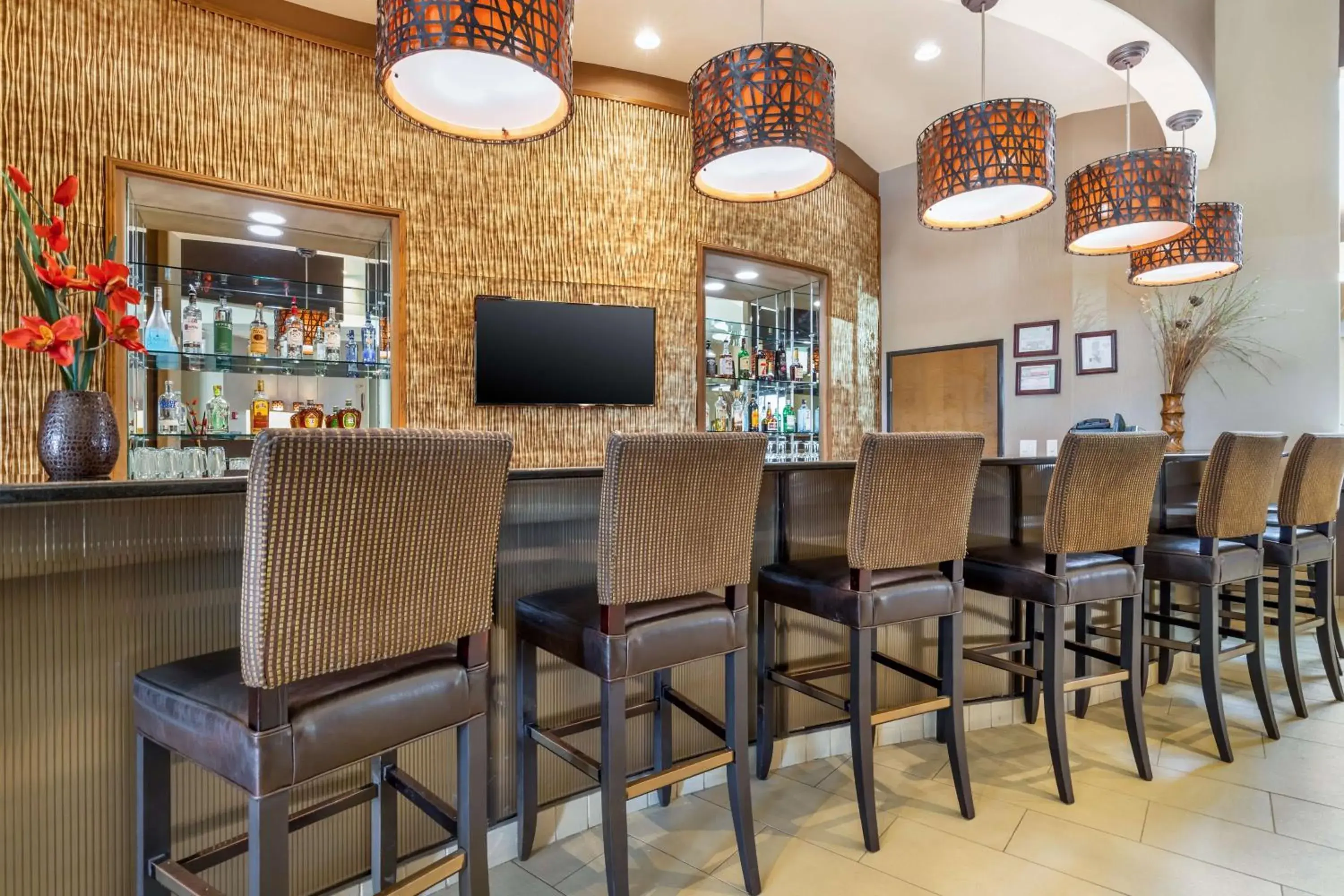 Lounge or bar in Best Western Plus Lackland Hotel and Suites. Lounge or bar in Best Western Plus Lackland Hotel and Suites.