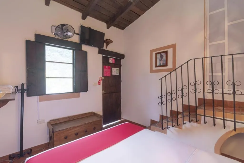 Bed in Hotel Coyopolan