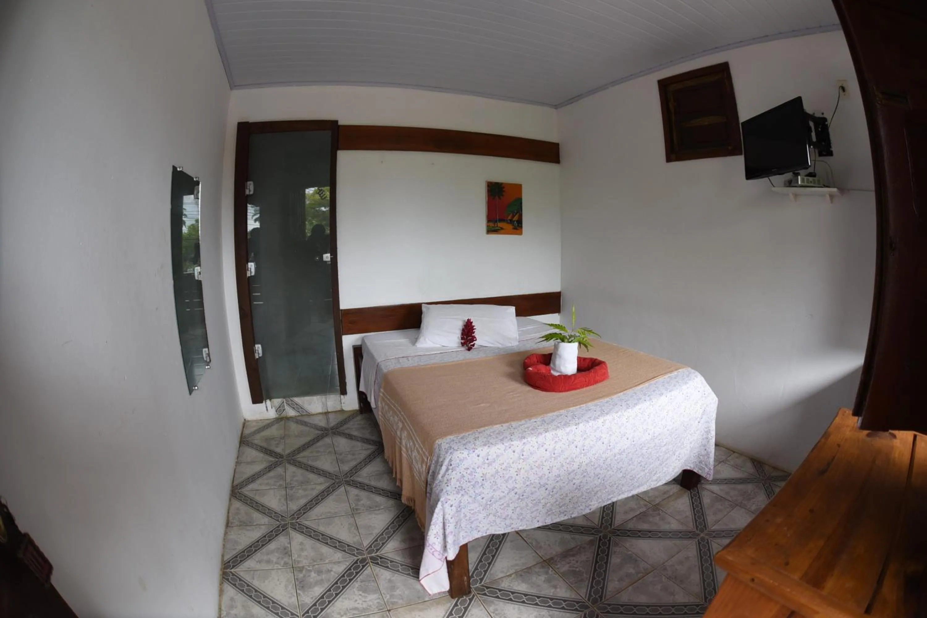 Bed in Pico das Praias Suites
