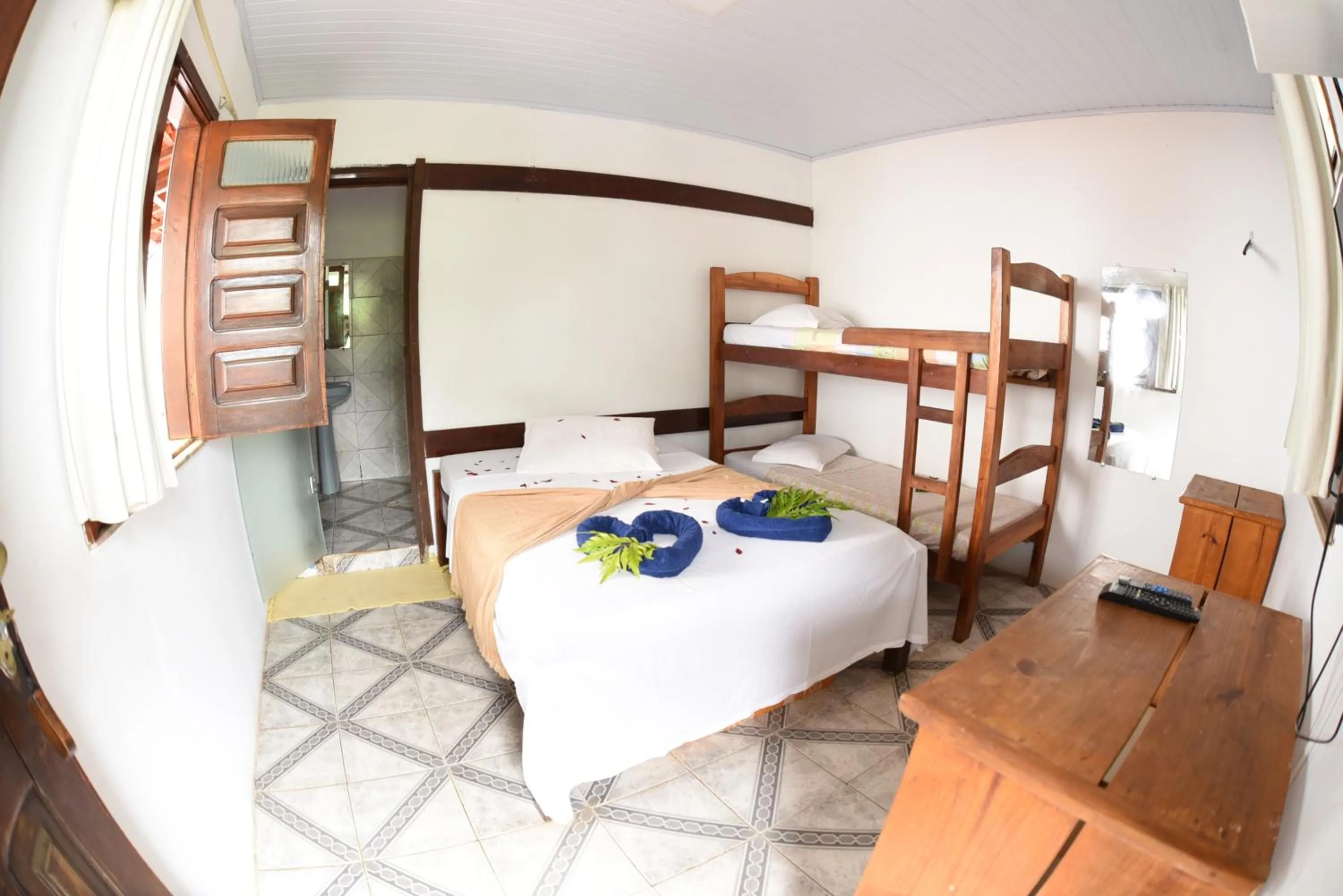 Bed in Pico das Praias Suites