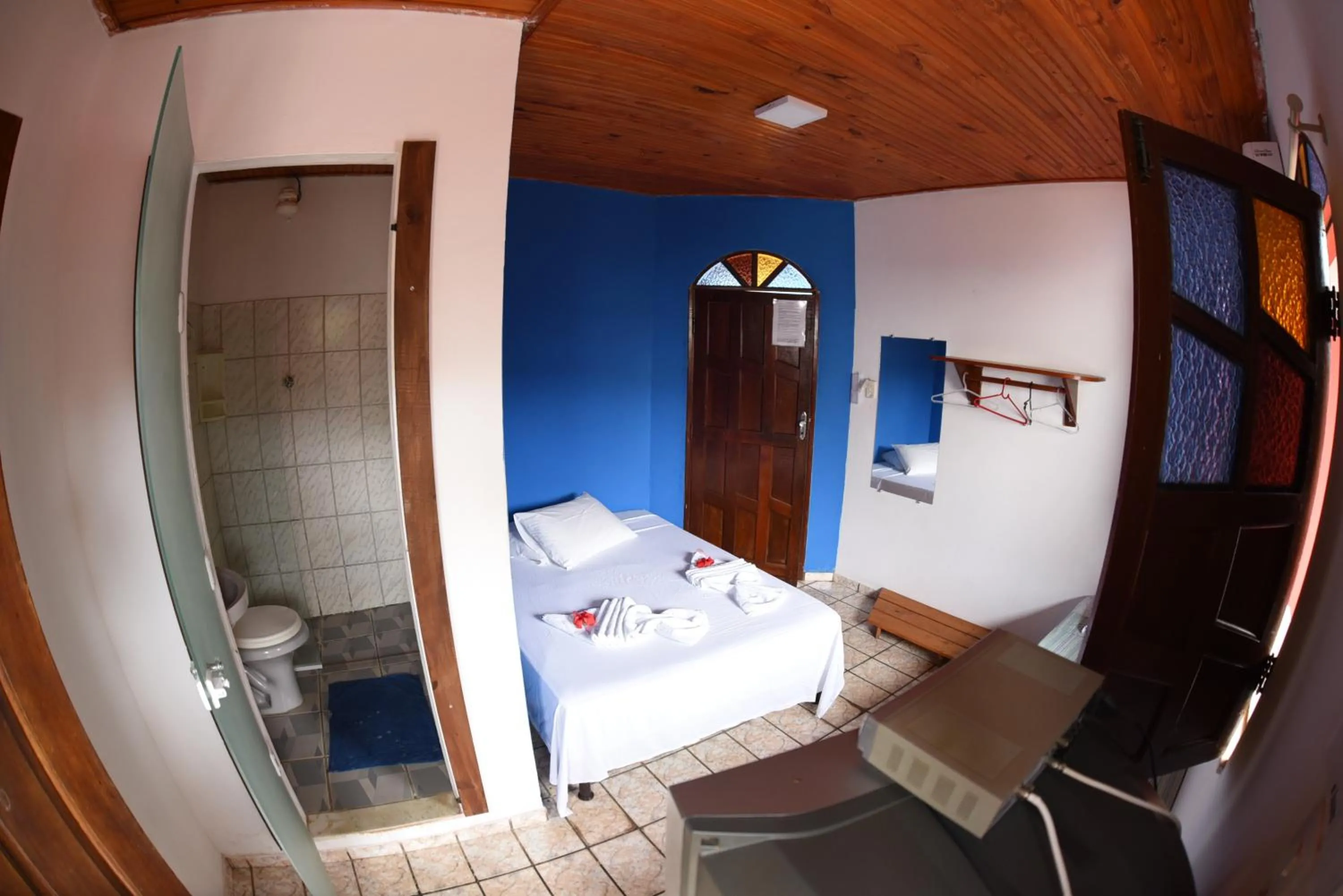 Bed in Pico das Praias Suites