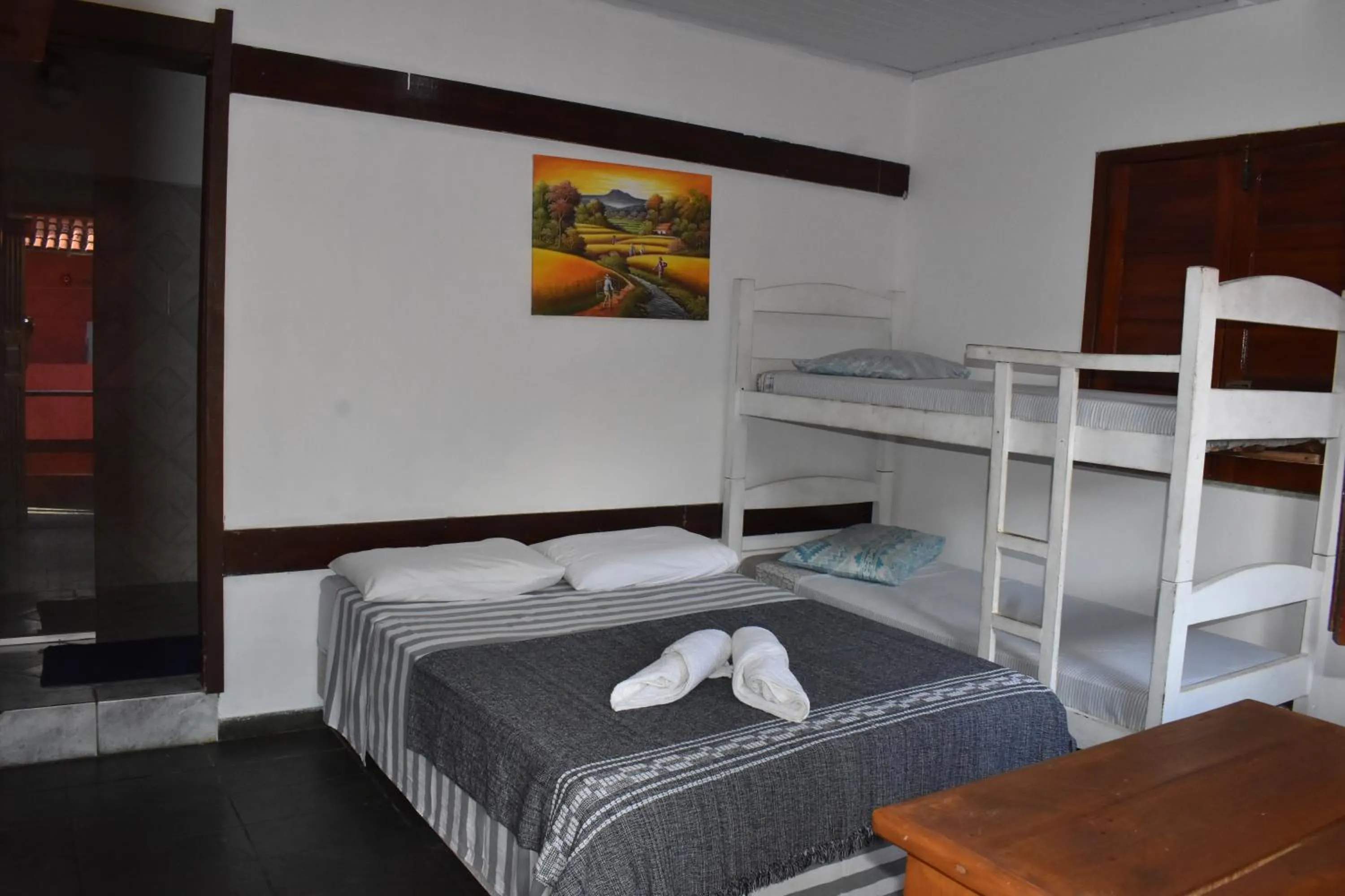 Bed in Pico das Praias Suites