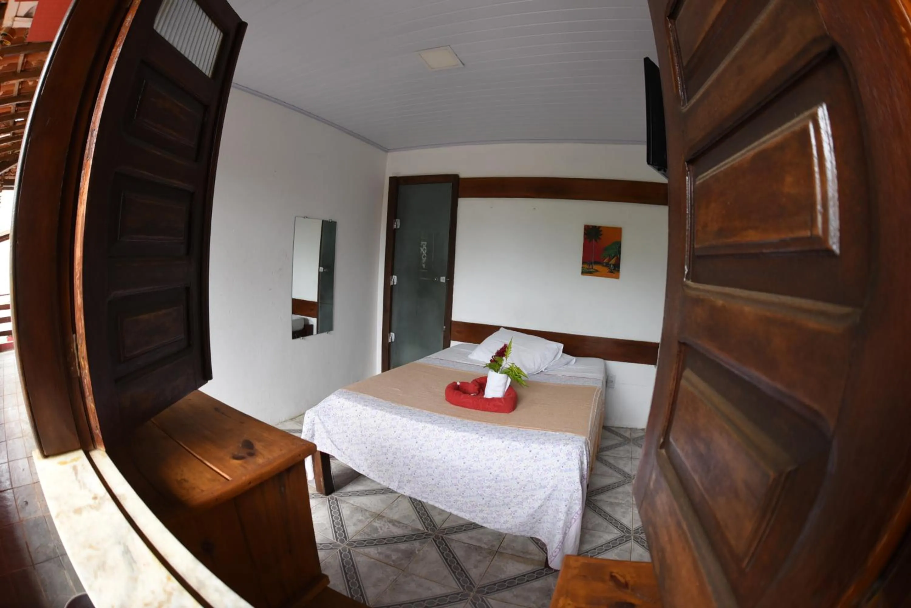 Bed in Pico das Praias Suites