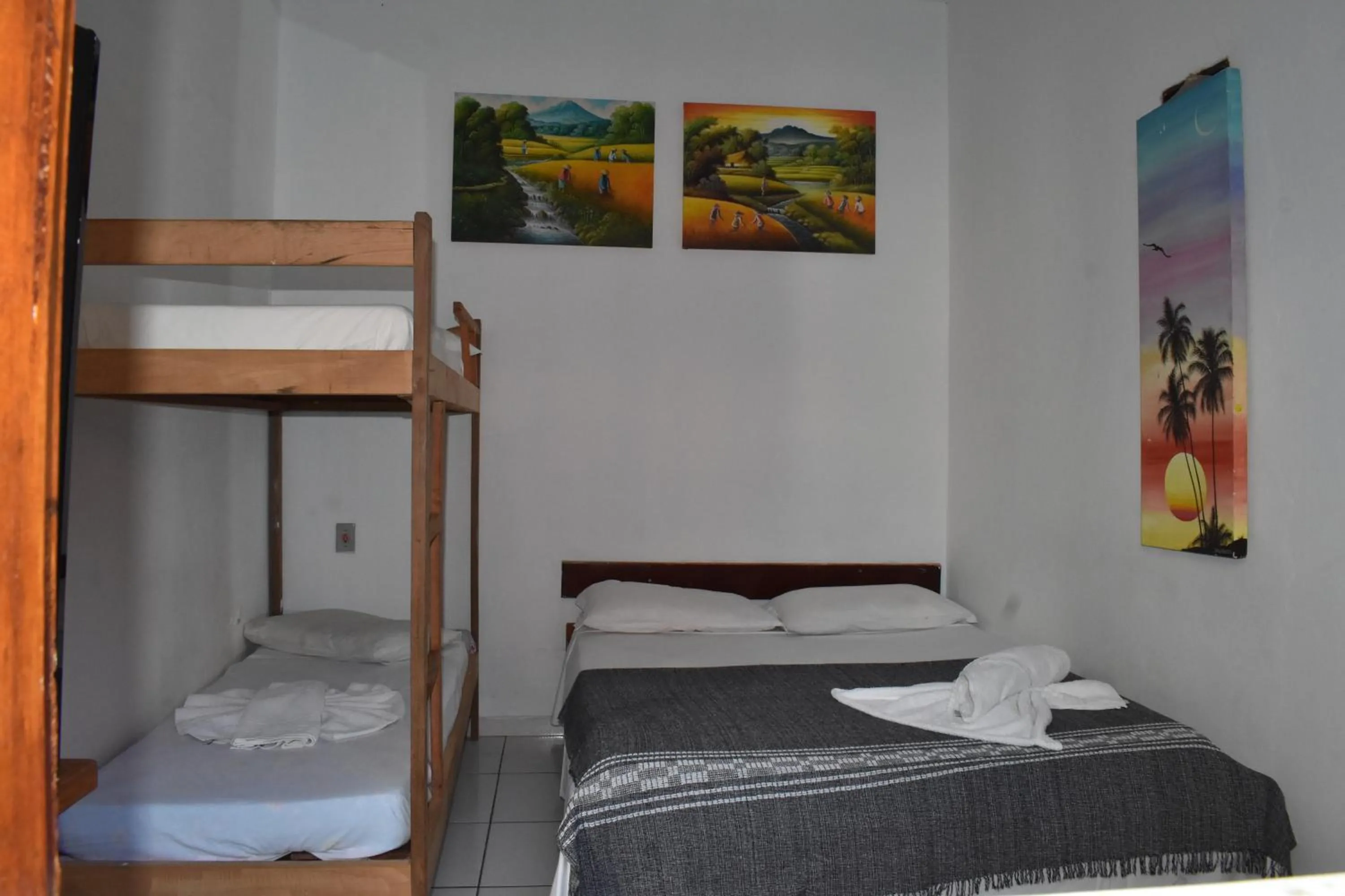 Bed in Pico das Praias Suites