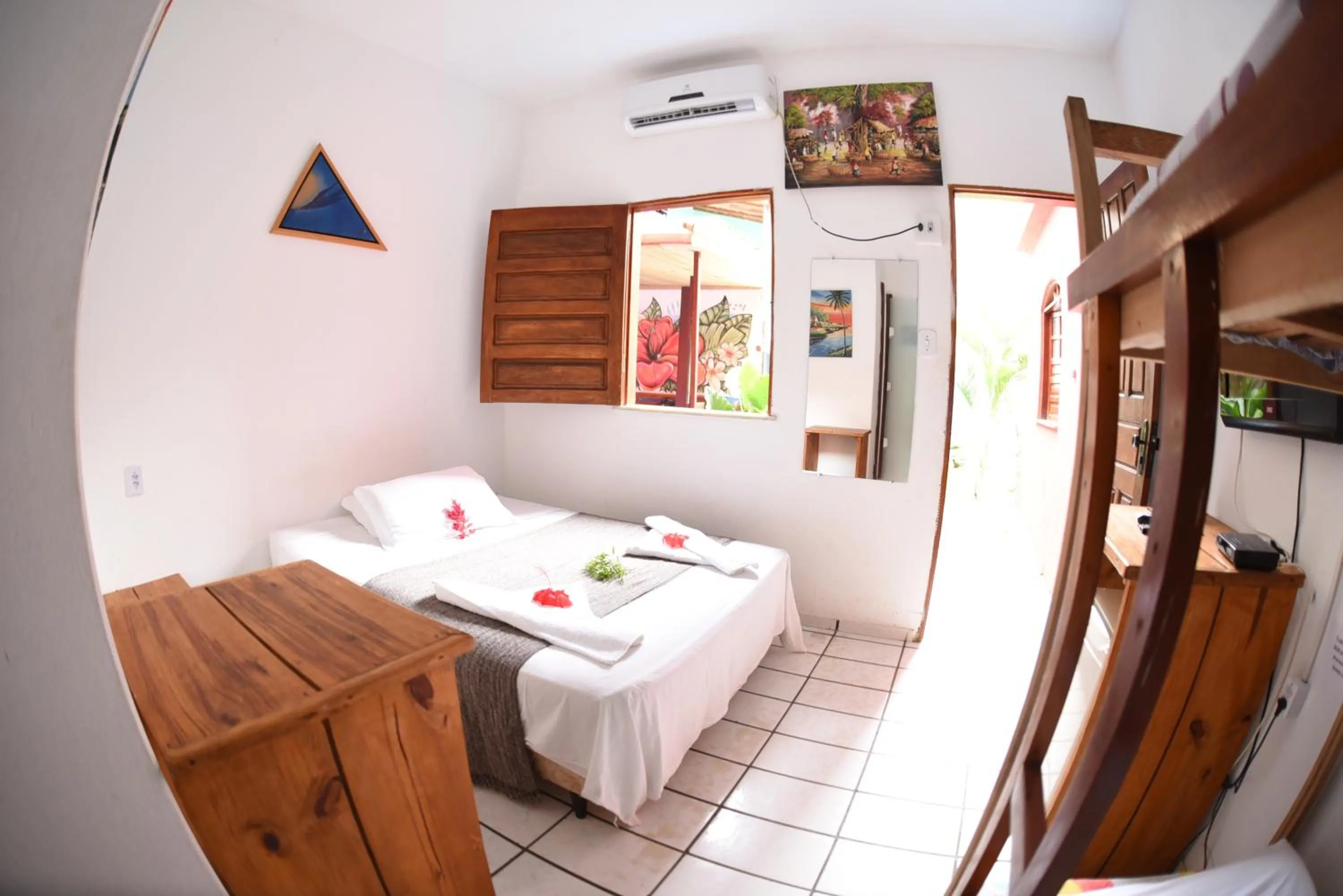 Bed in Pico das Praias Suites
