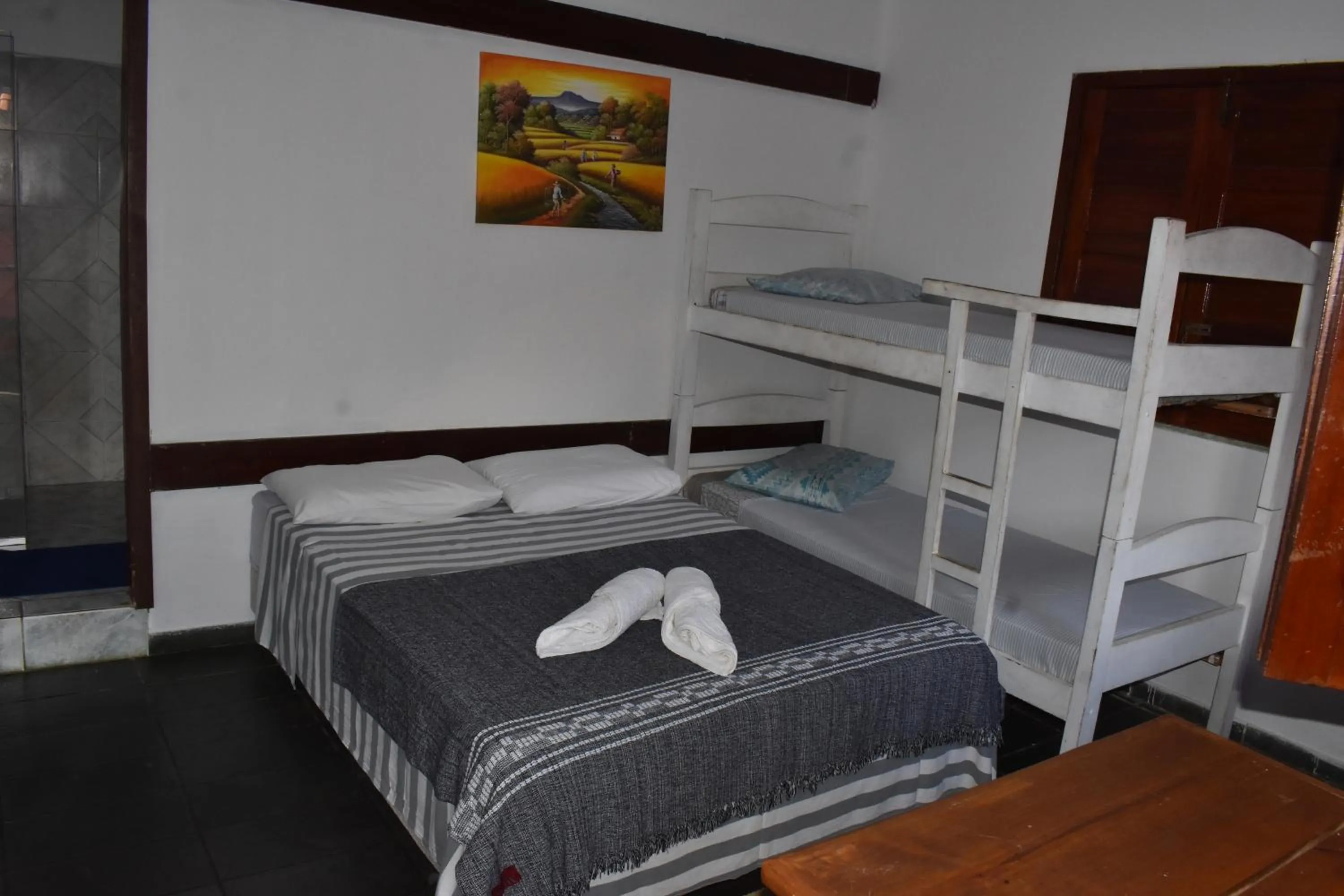 Bed in Pico das Praias Suites