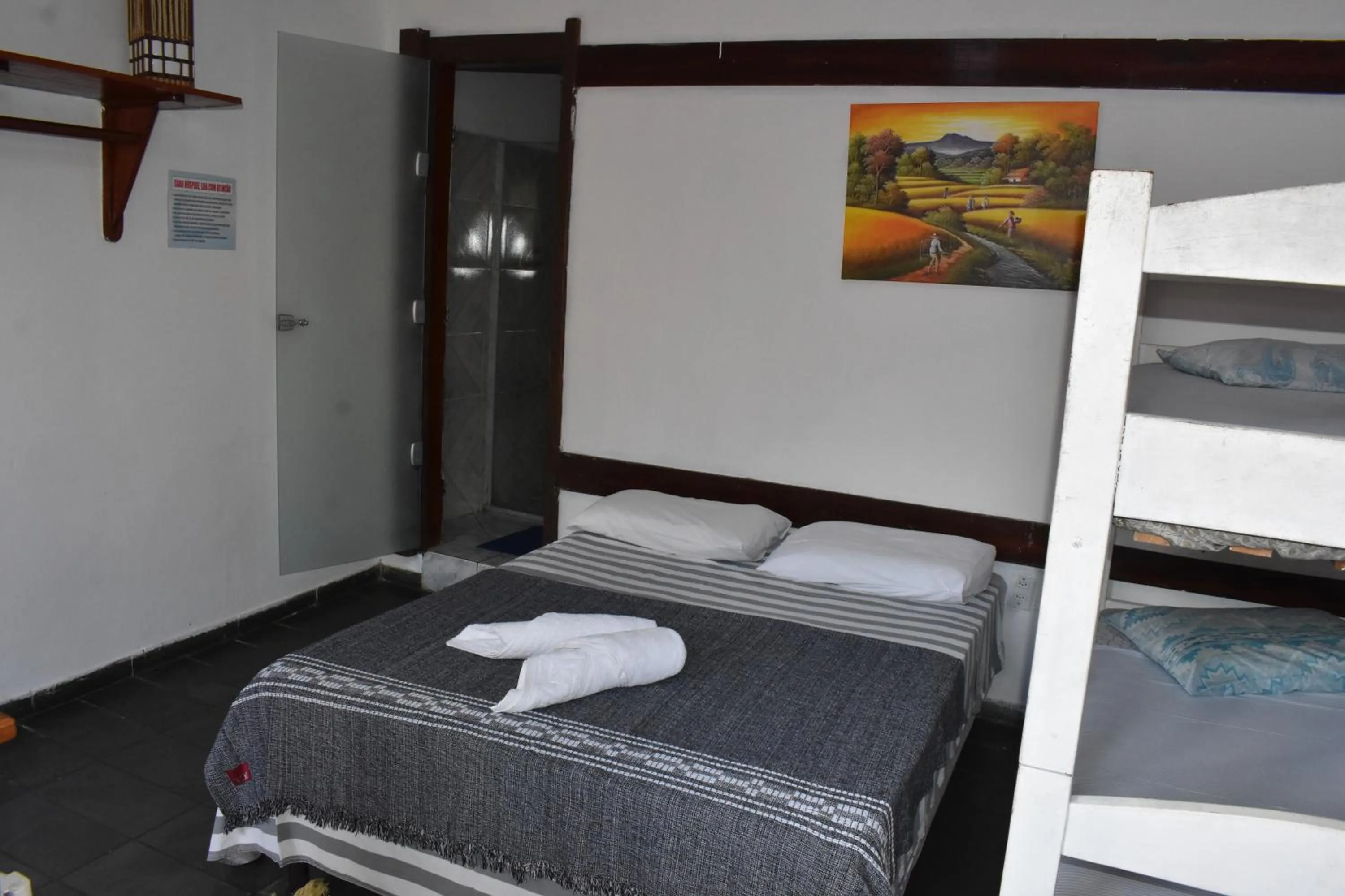 Bed in Pico das Praias Suites