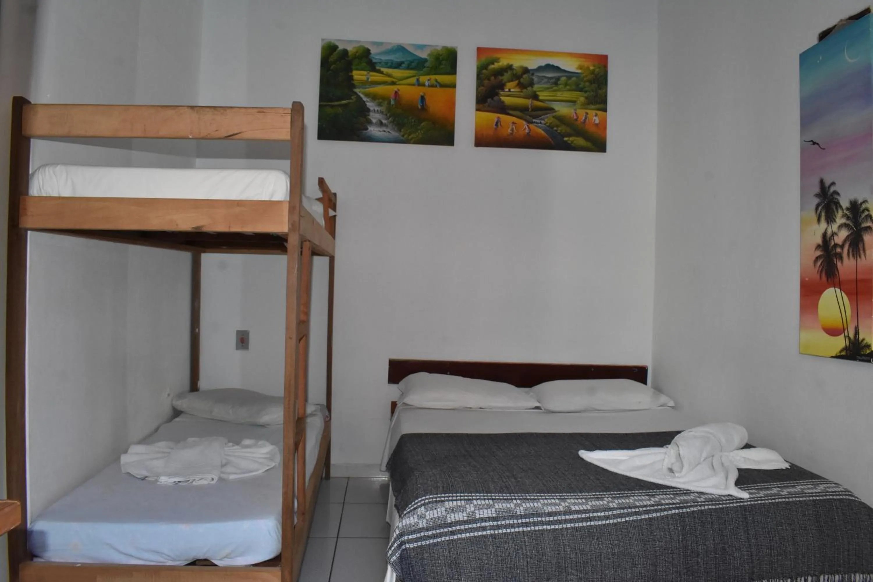 Bed in Pico das Praias Suites