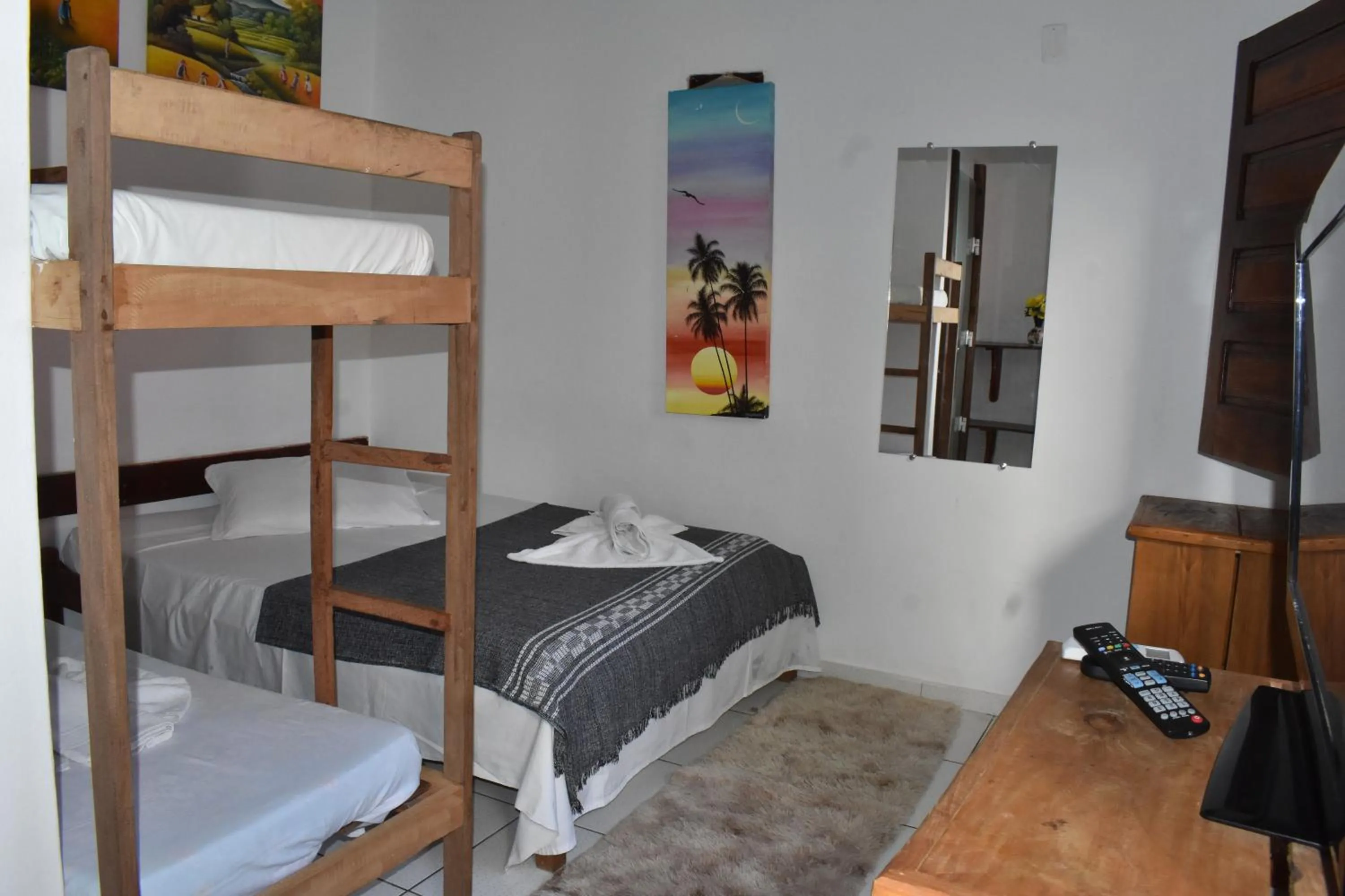 Bed in Pico das Praias Suites