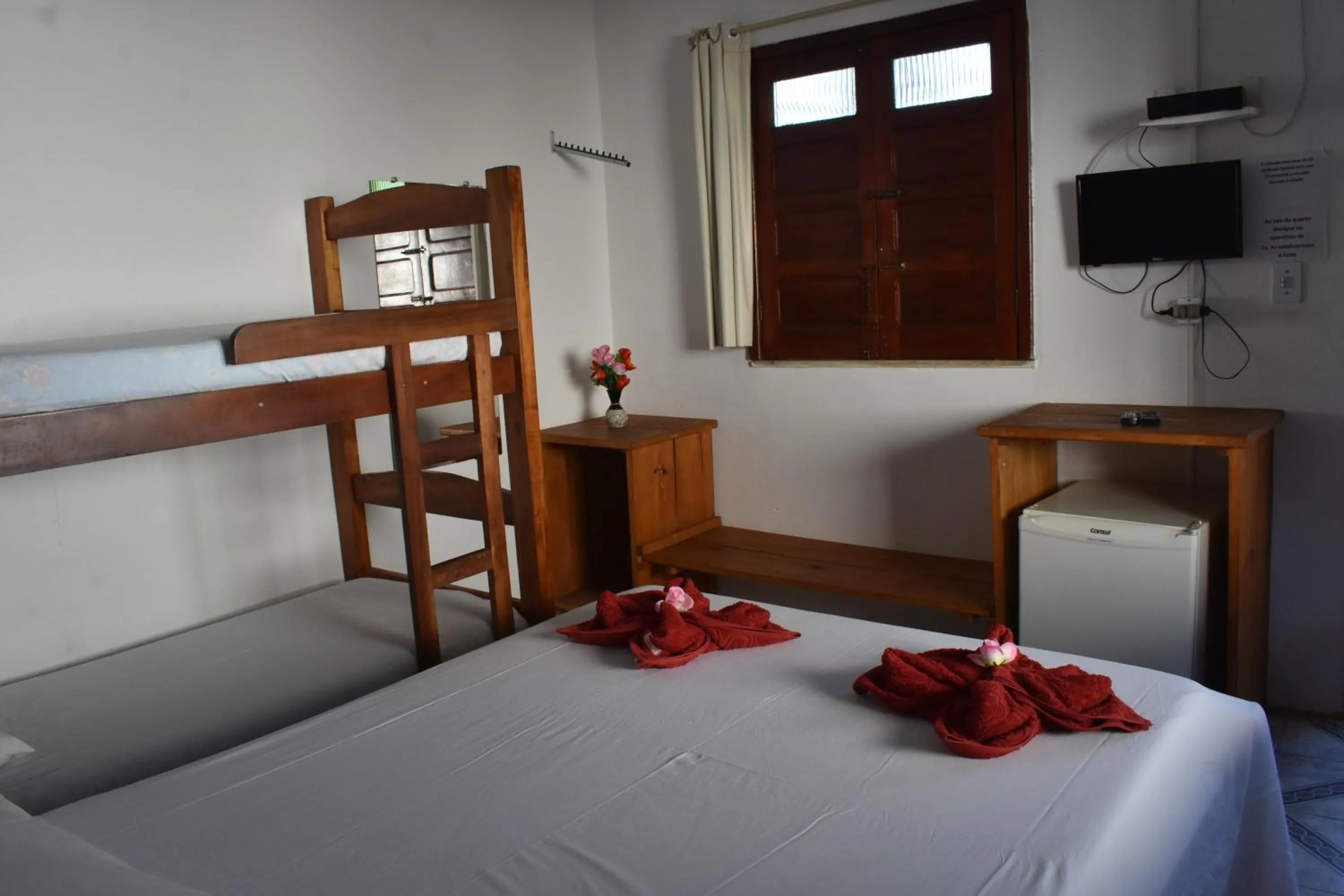 Bed in Pico das Praias Suites