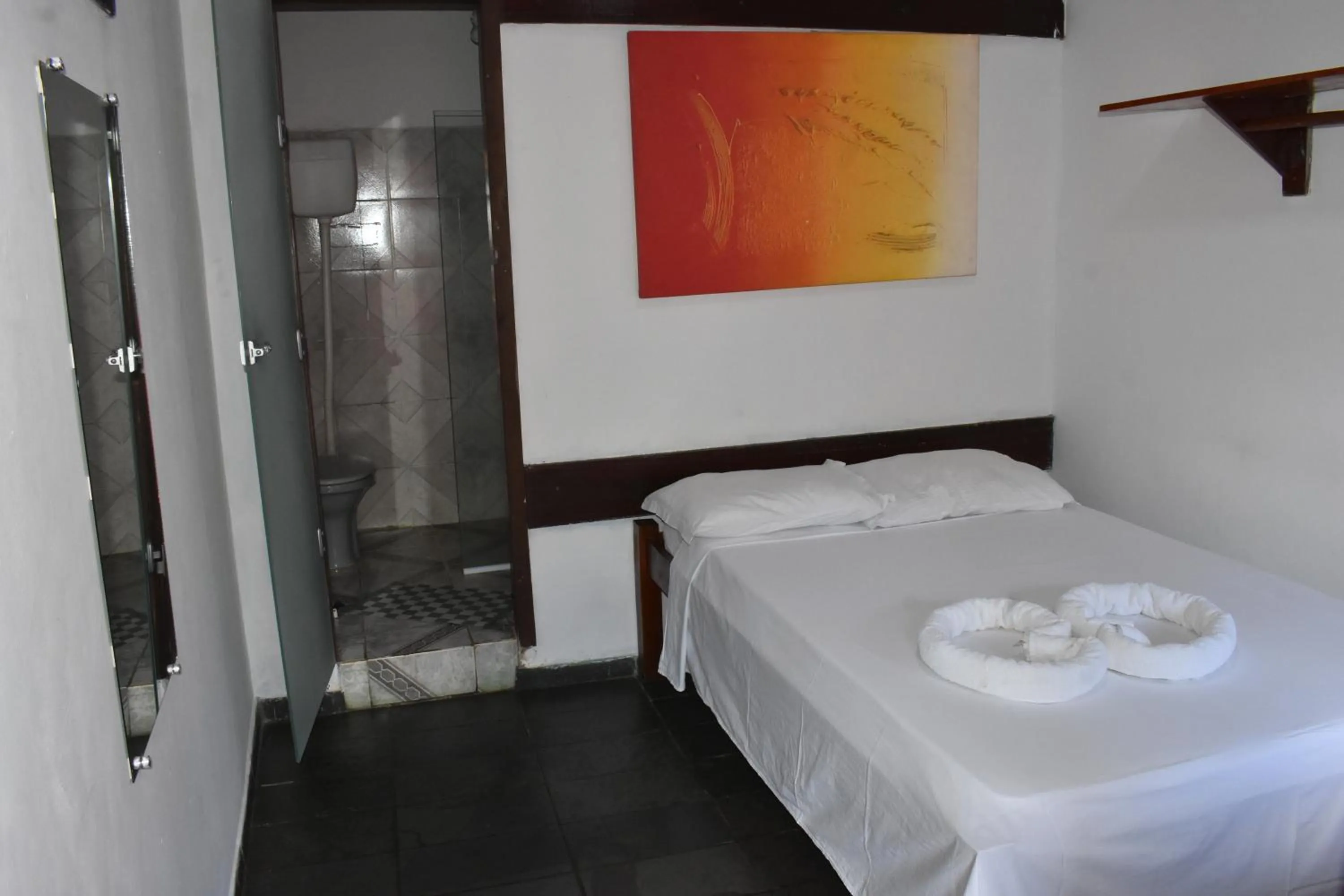 Bed in Pico das Praias Suites