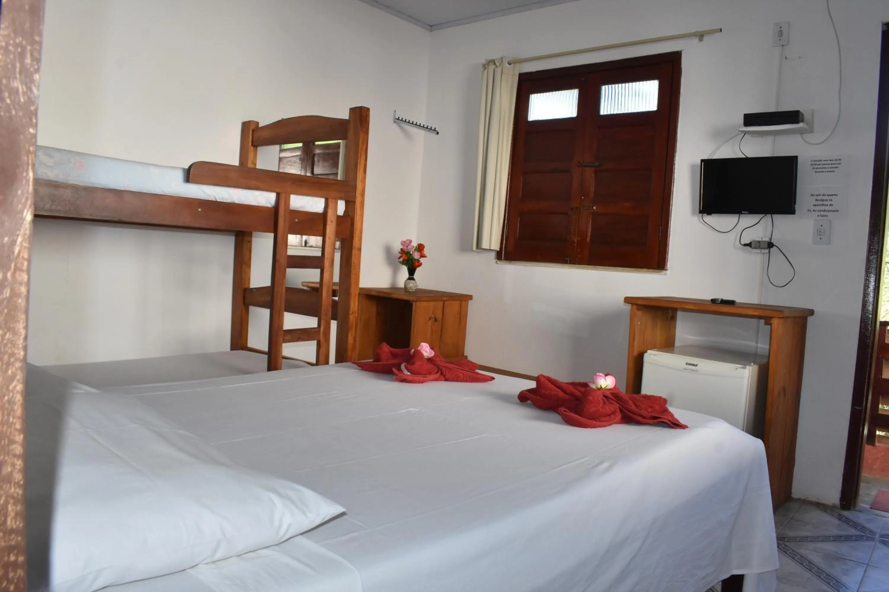 Bed in Pico das Praias Suites