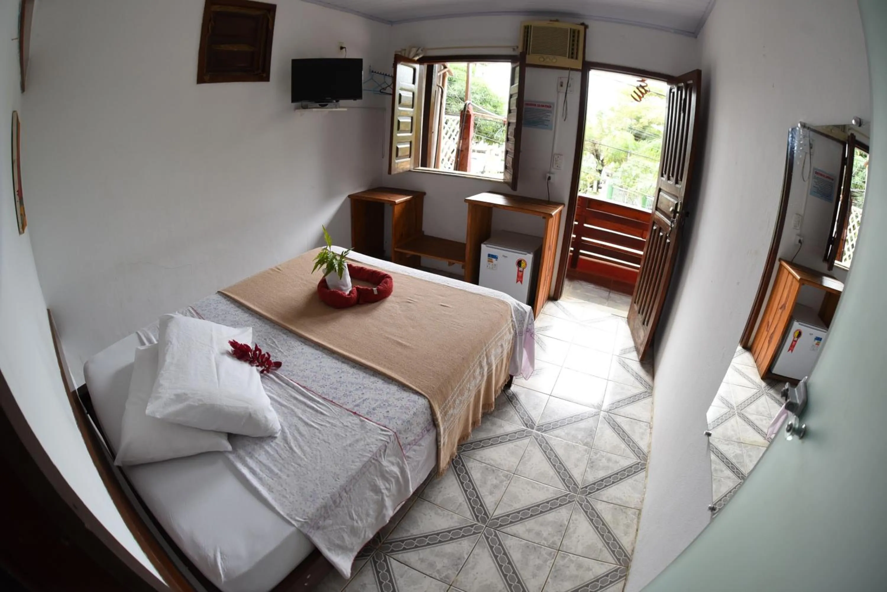 Bed in Pico das Praias Suites