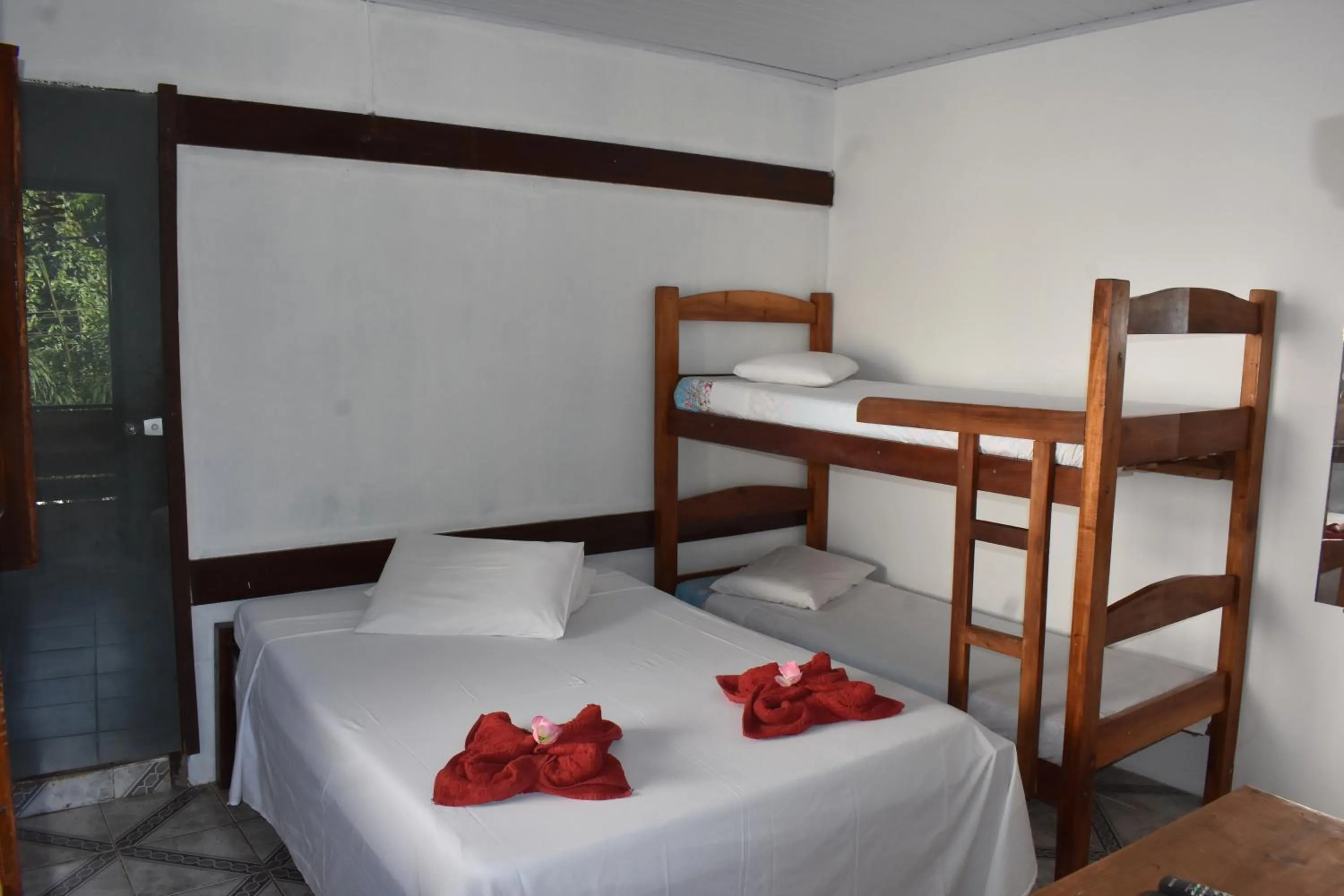 Bed in Pico das Praias Suites