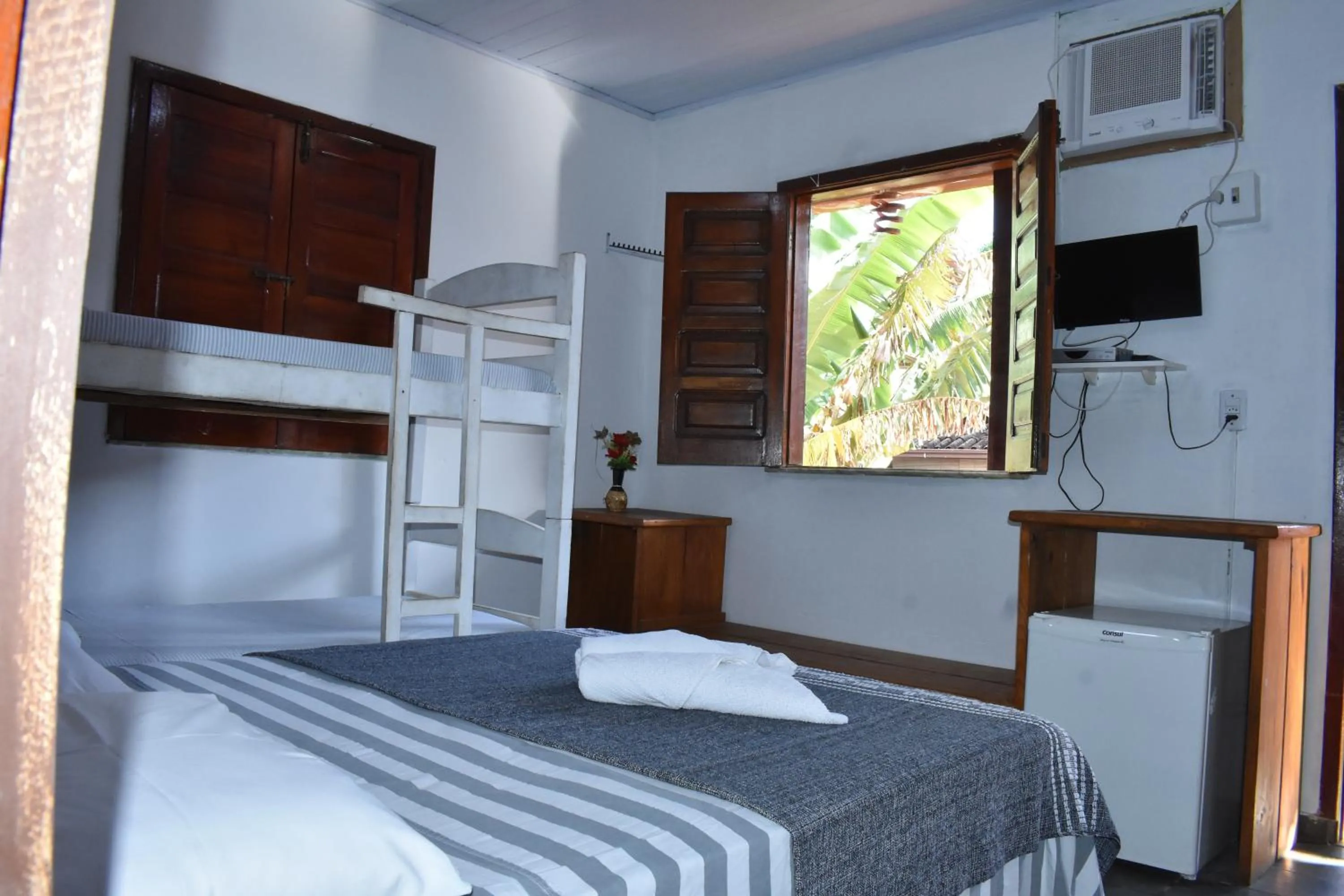 Bed in Pico das Praias Suites