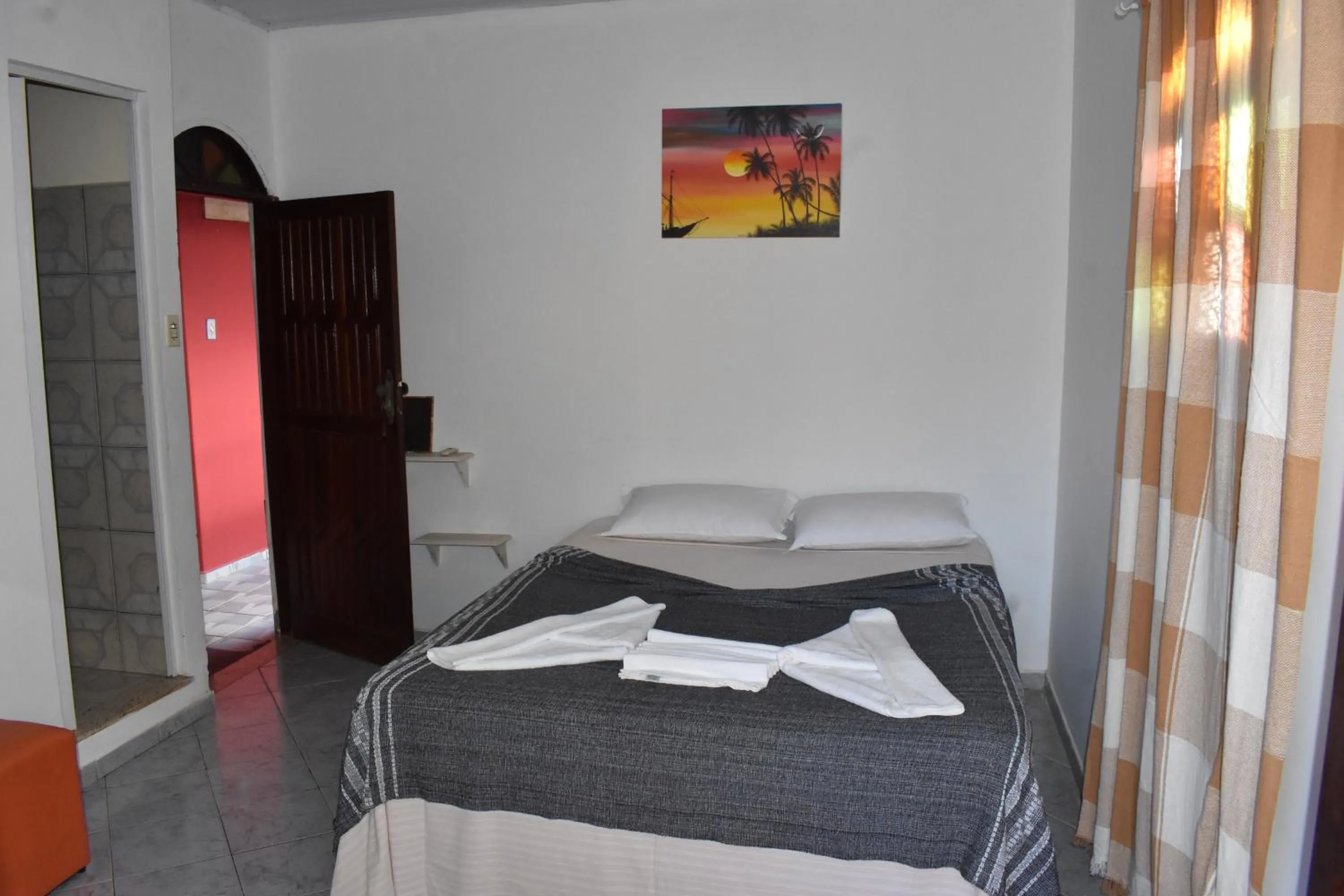 Bed in Pico das Praias Suites