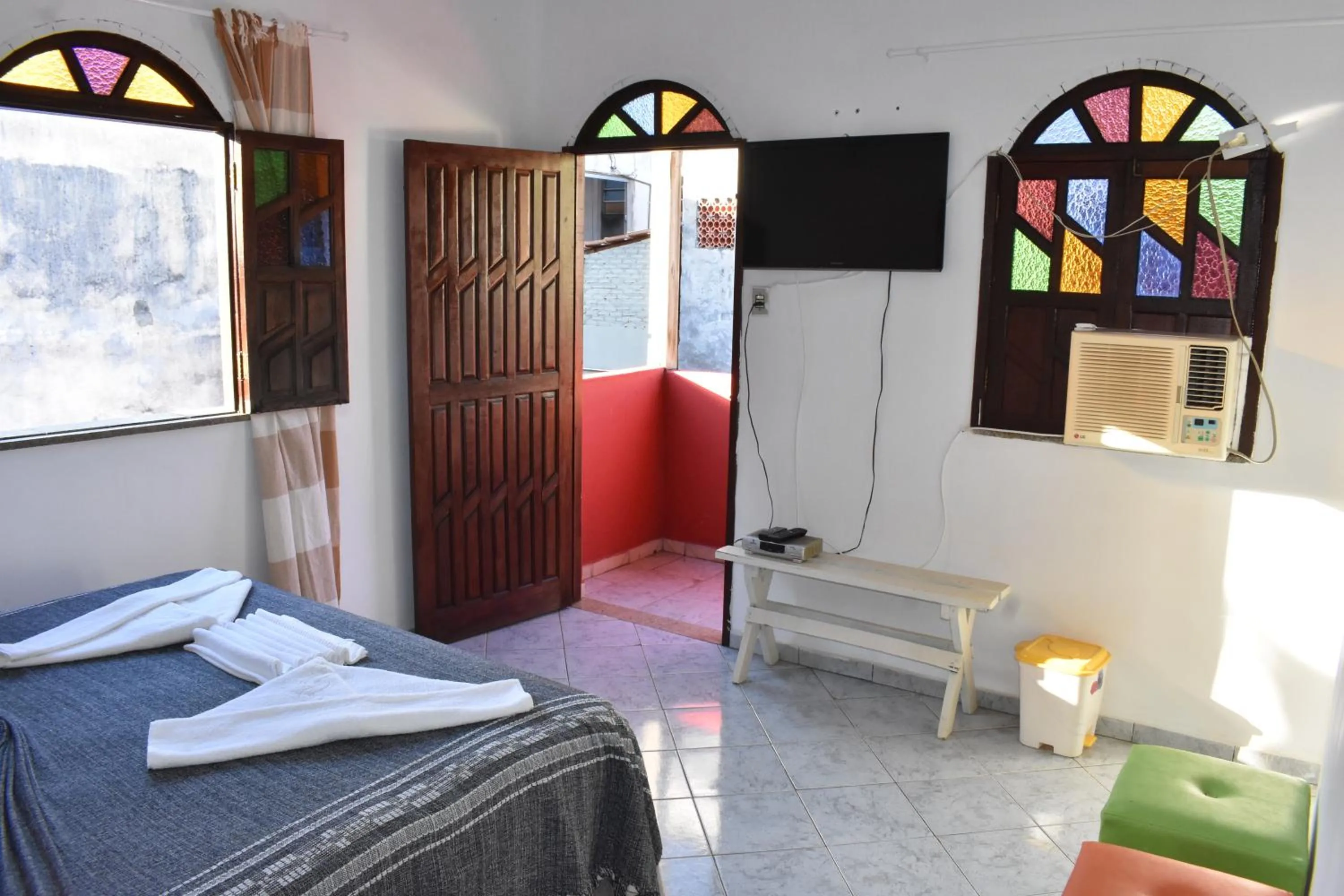 Bed in Pico das Praias Suites