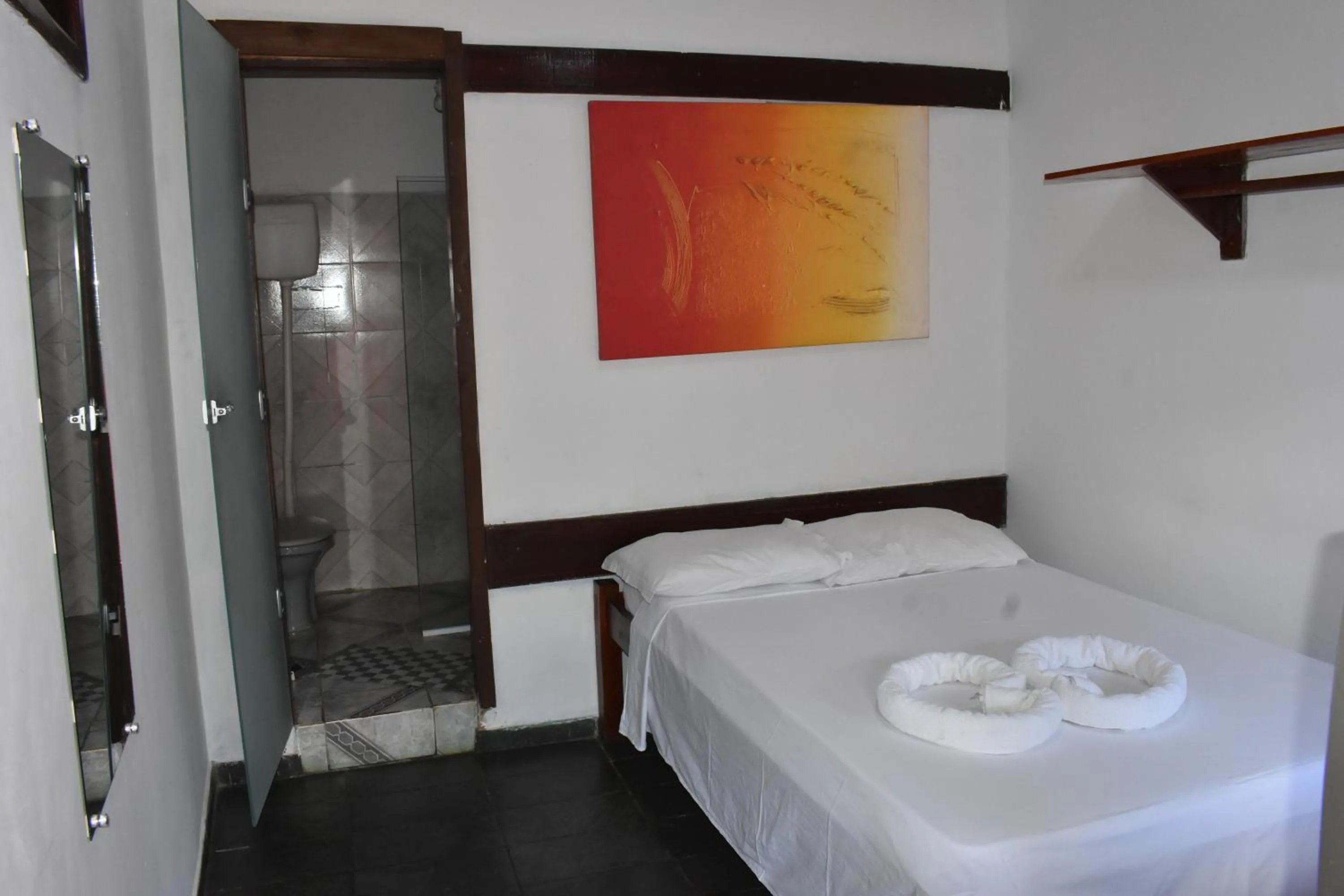 Bed in Pico das Praias Suites