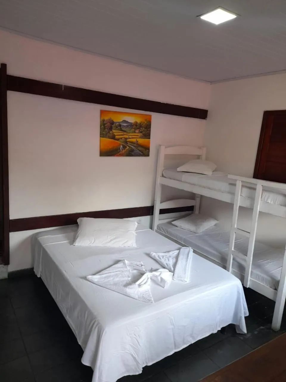 Bed in Pico das Praias Suites