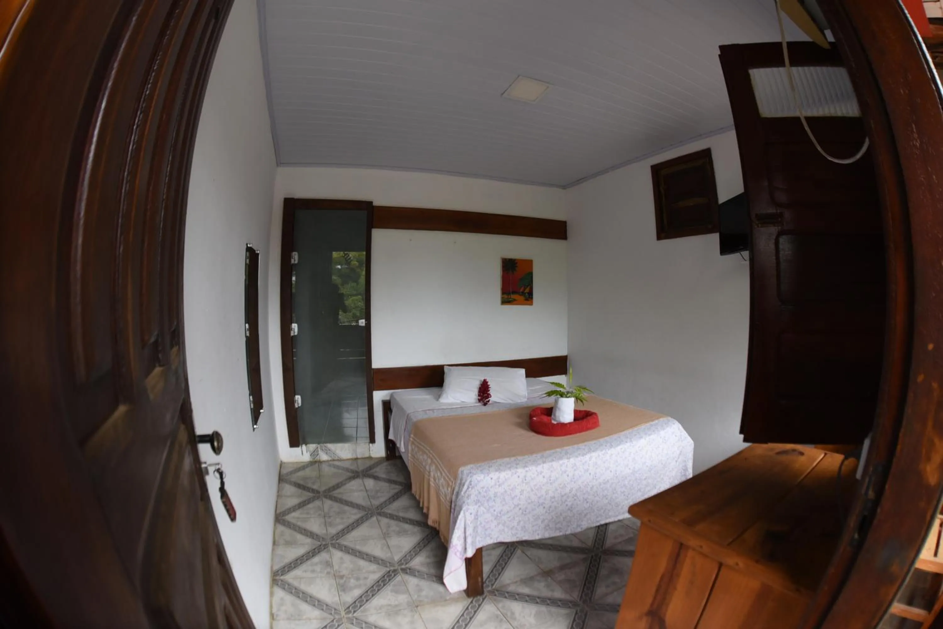 Bed in Pico das Praias Suites