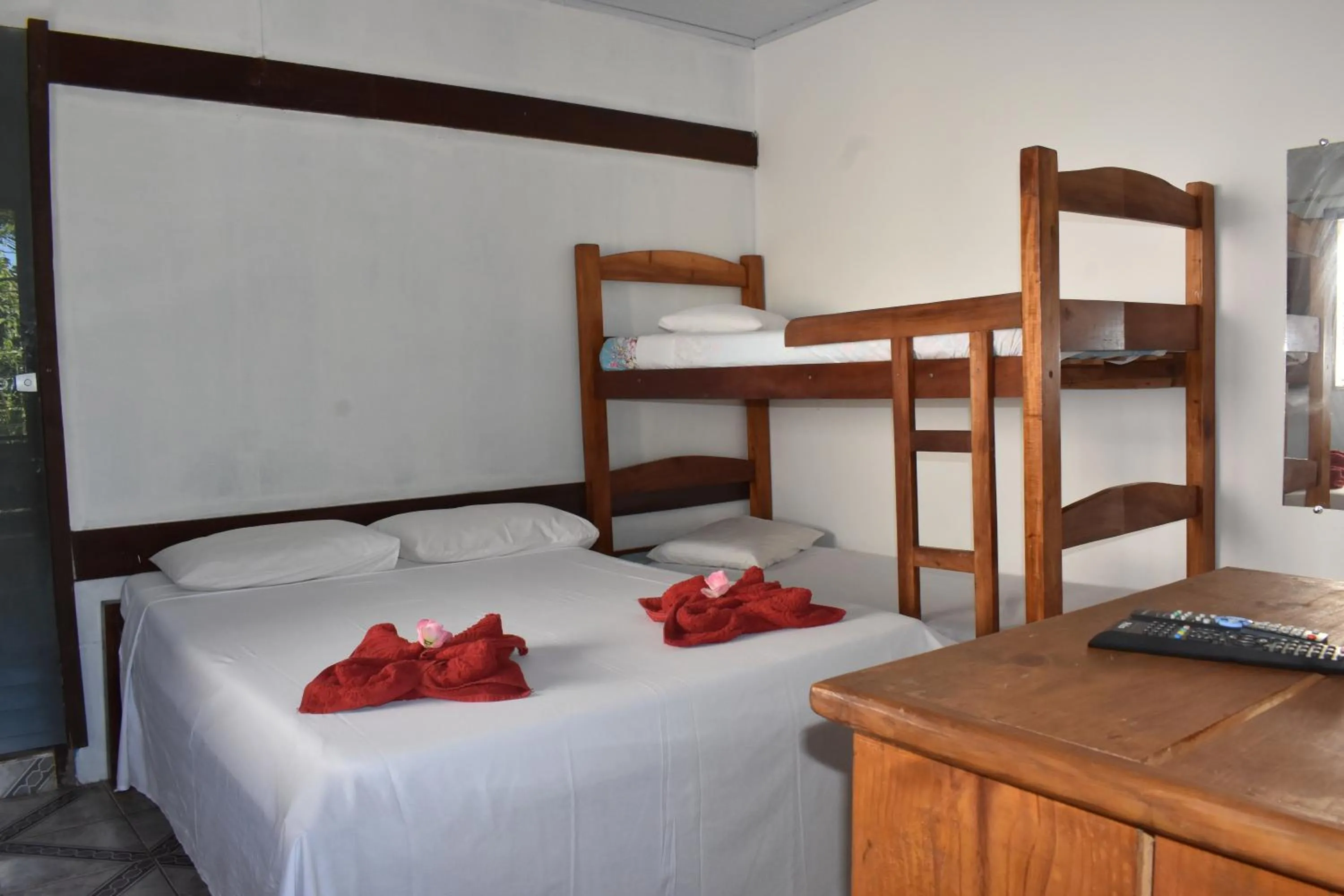 Bed in Pico das Praias Suites