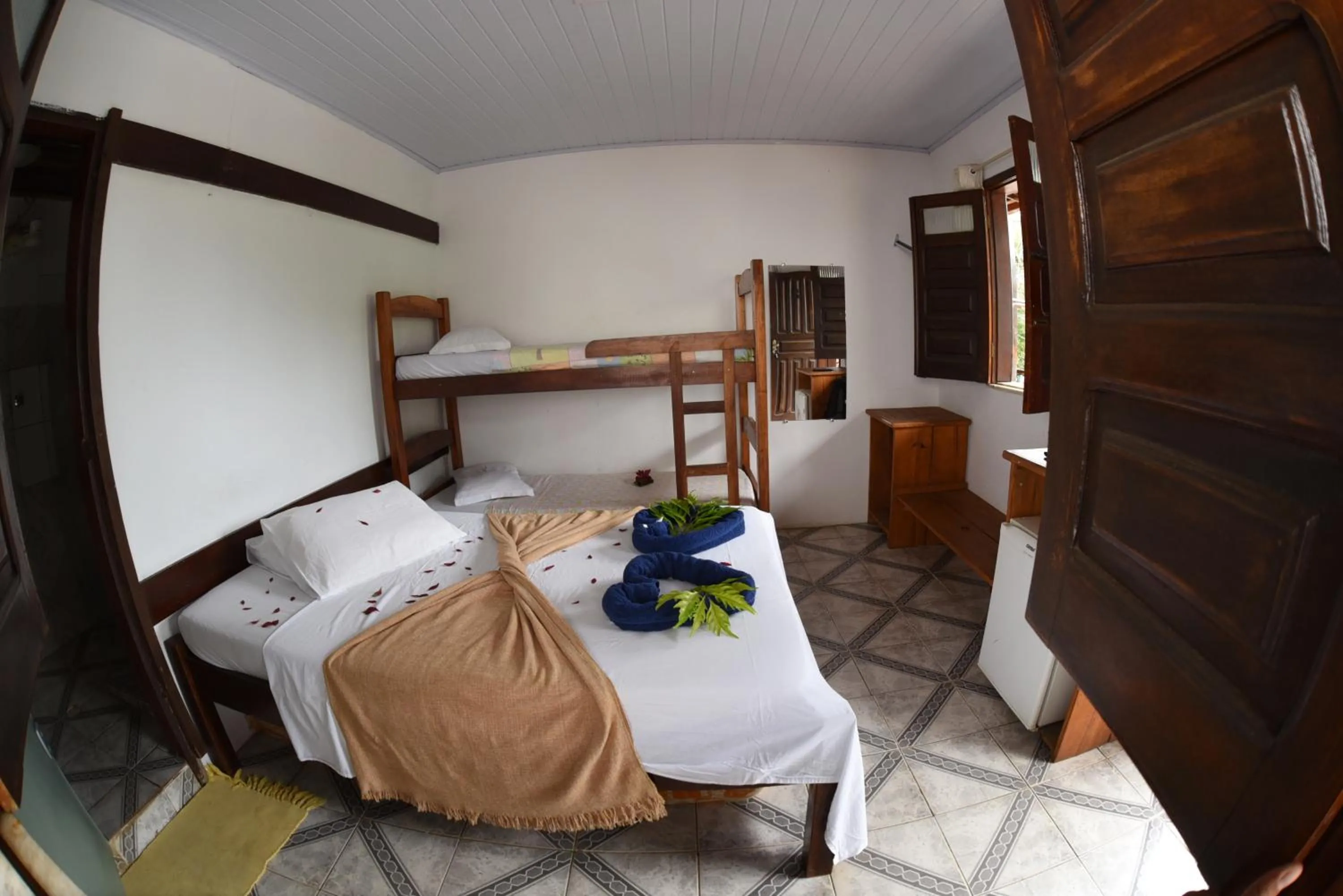 Bed in Pico das Praias Suites