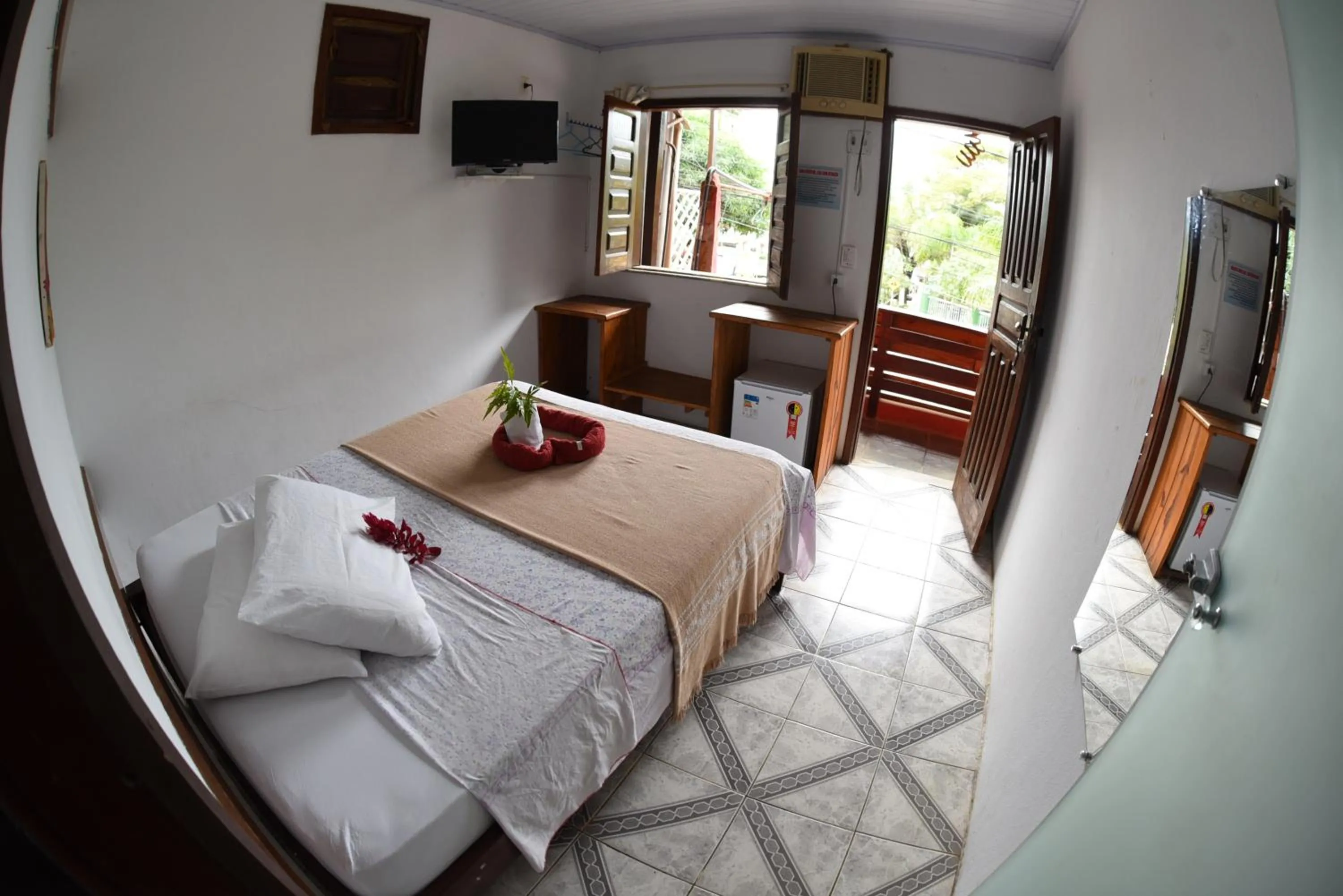 Bed in Pico das Praias Suites