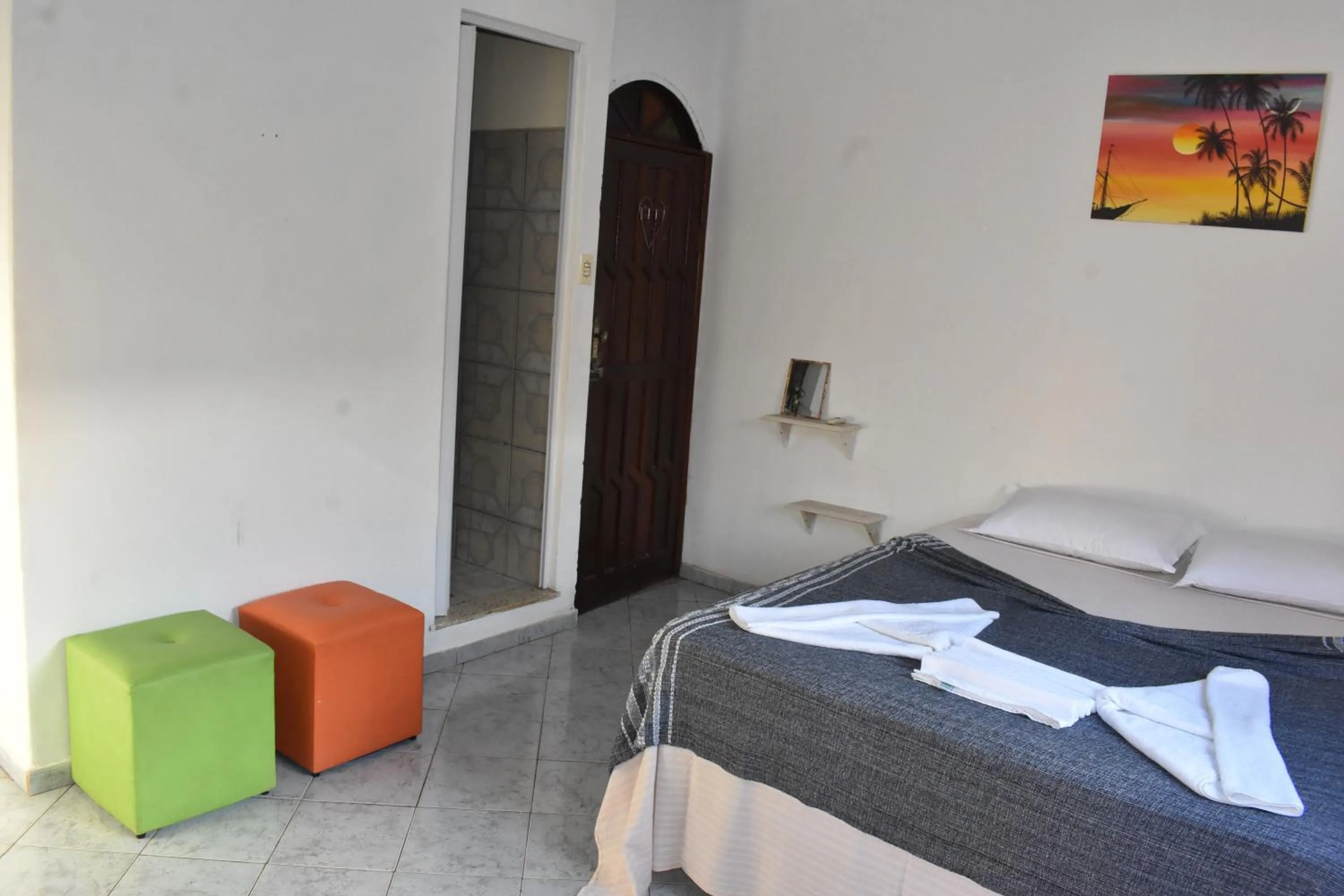 Bed in Pico das Praias Suites