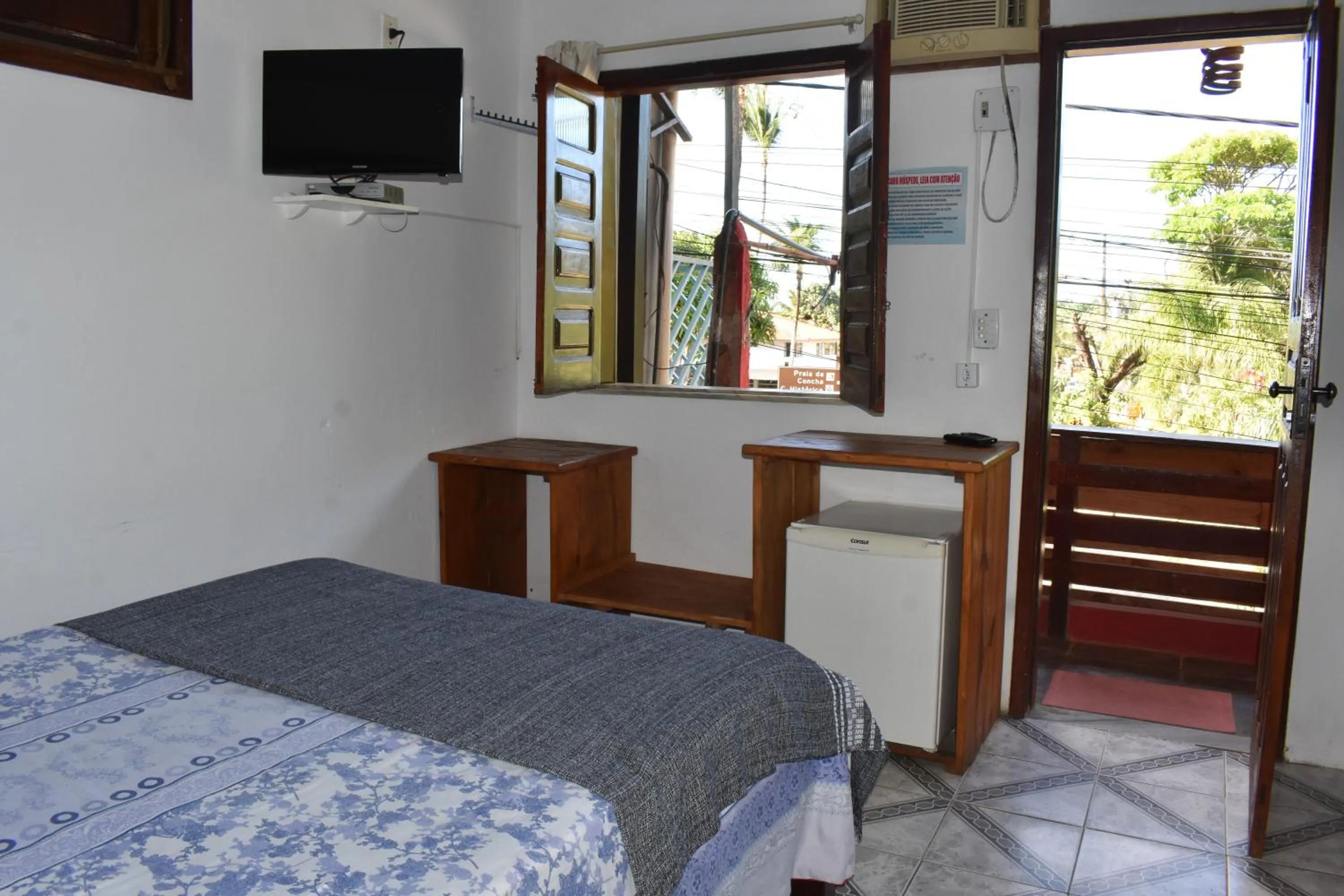 Bed in Pico das Praias Suites
