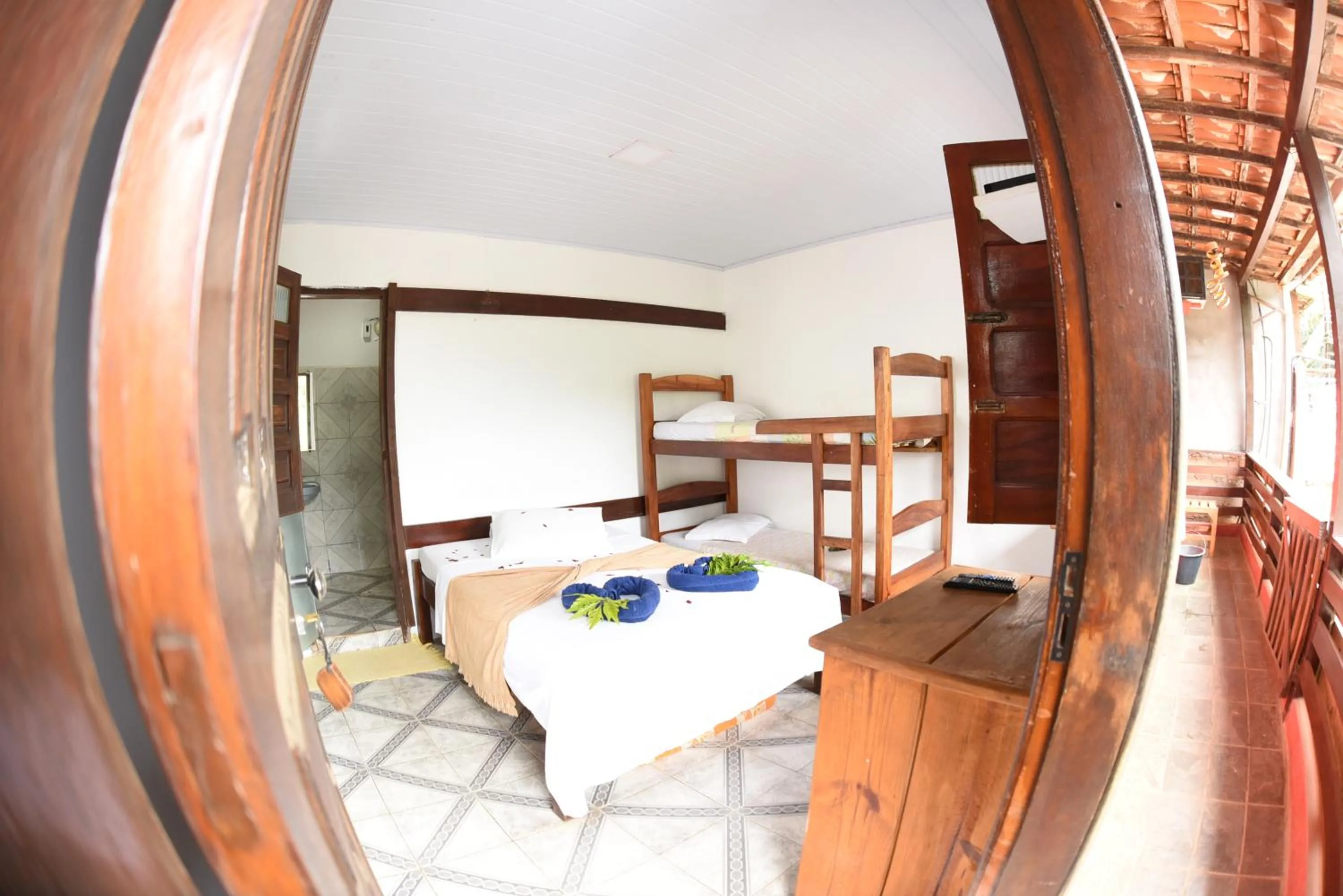 Bed in Pico das Praias Suites