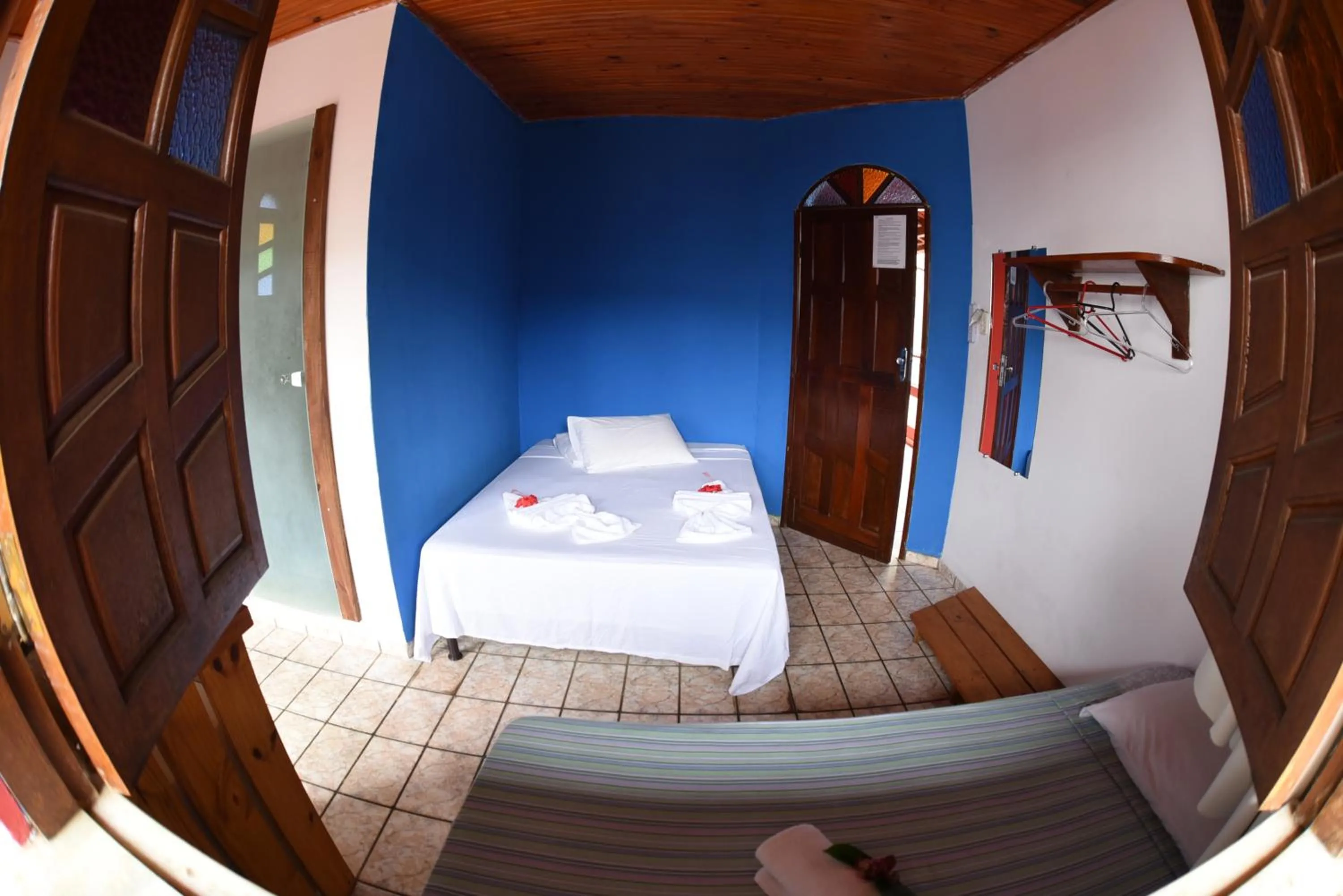 Bed in Pico das Praias Suites