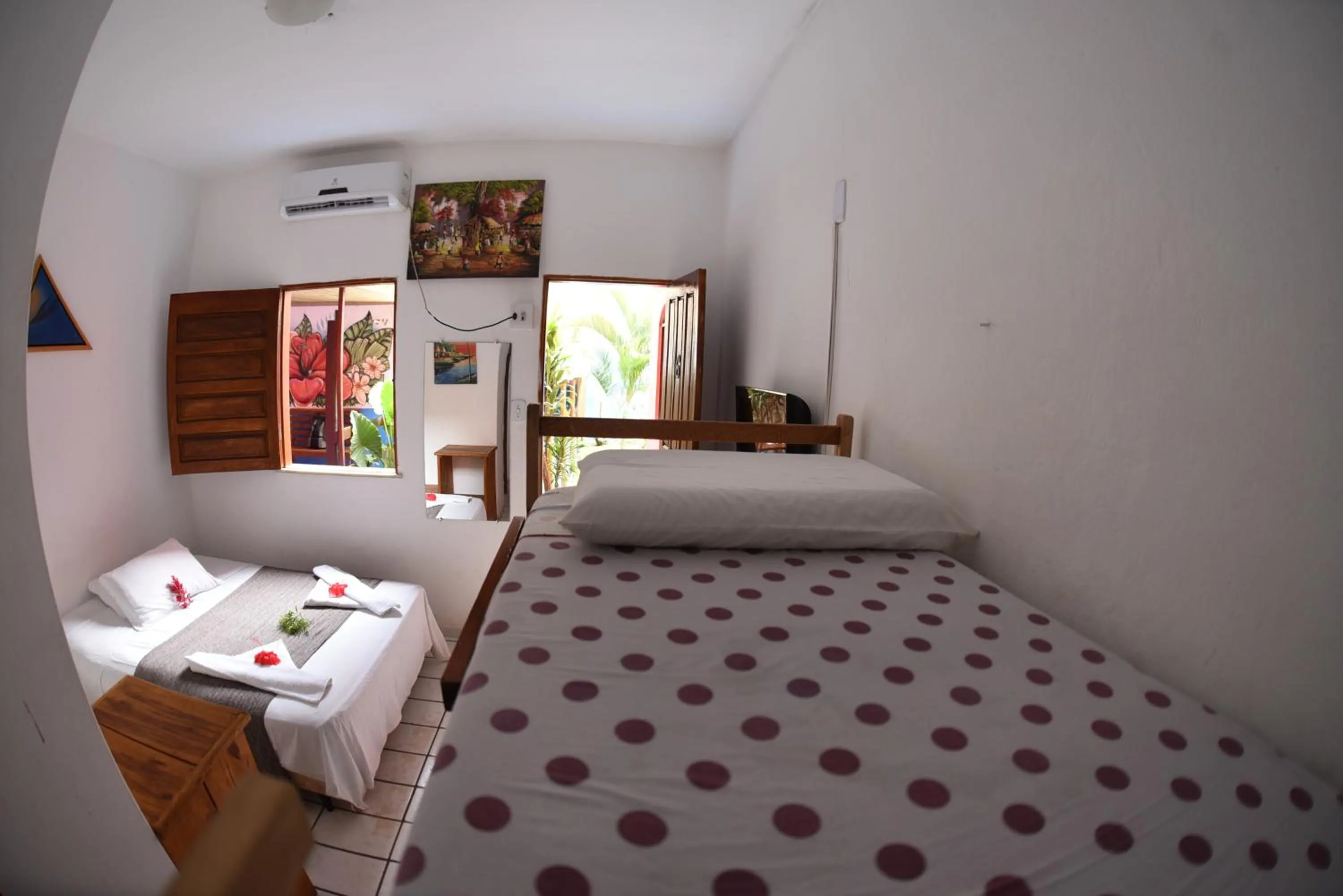 Bed in Pico das Praias Suites