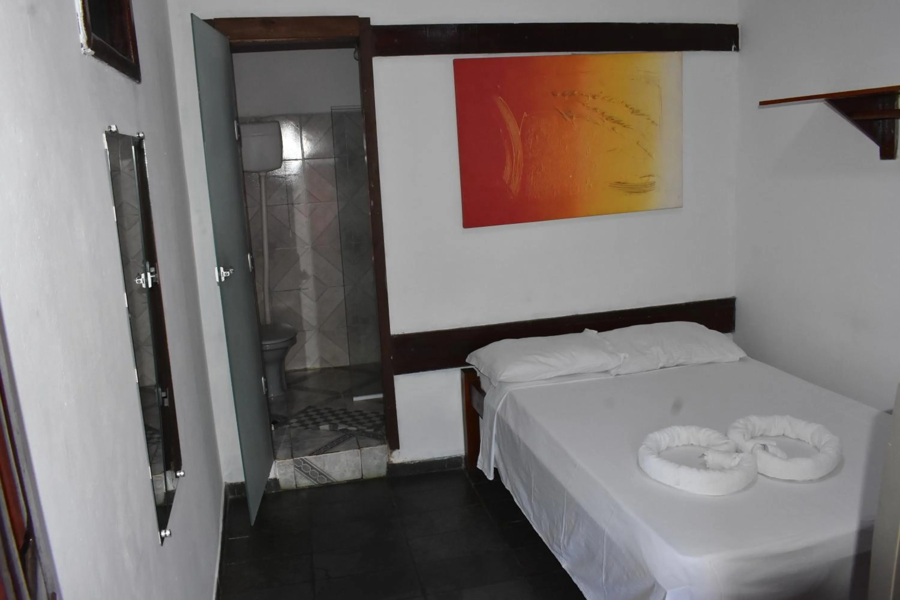 Bed in Pico das Praias Suites
