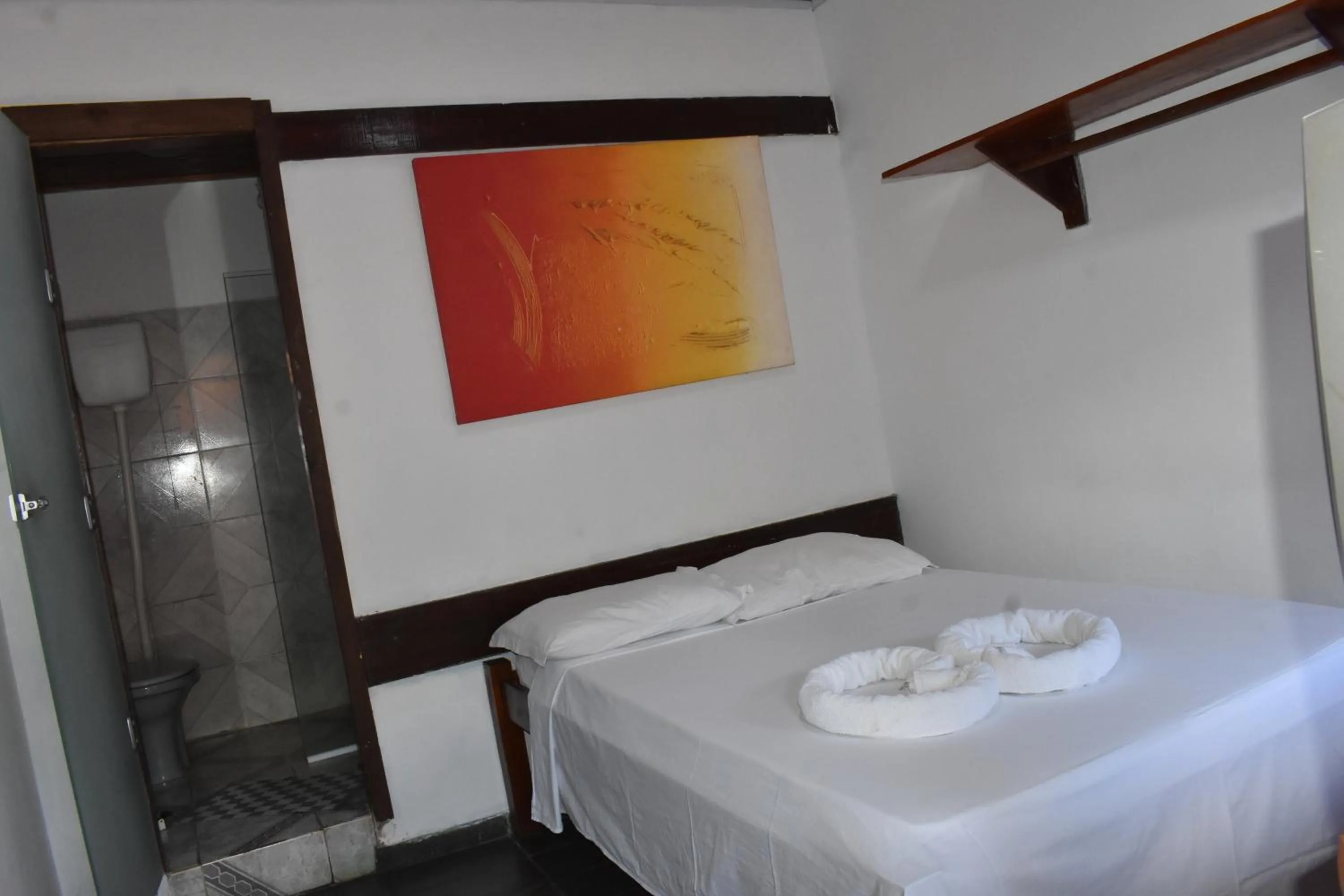 Bed in Pico das Praias Suites