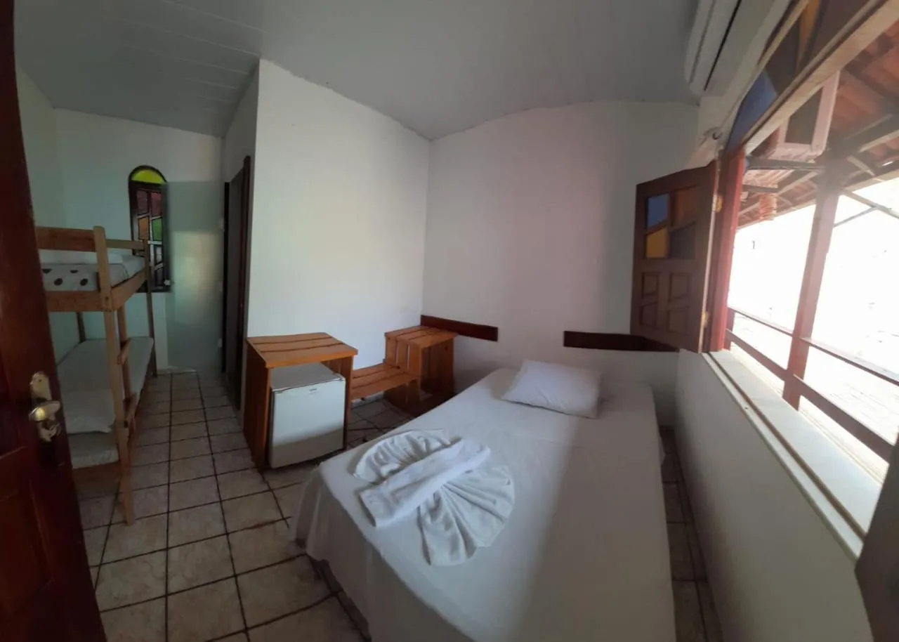 Bed in Pico das Praias Suites