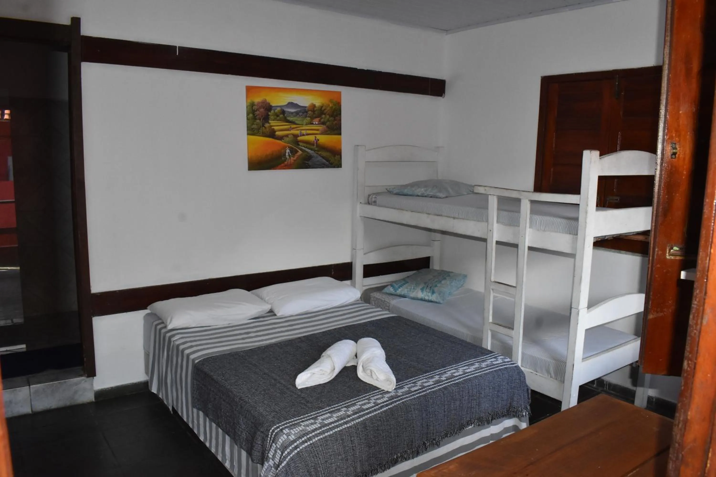 Bed in Pico das Praias Suites