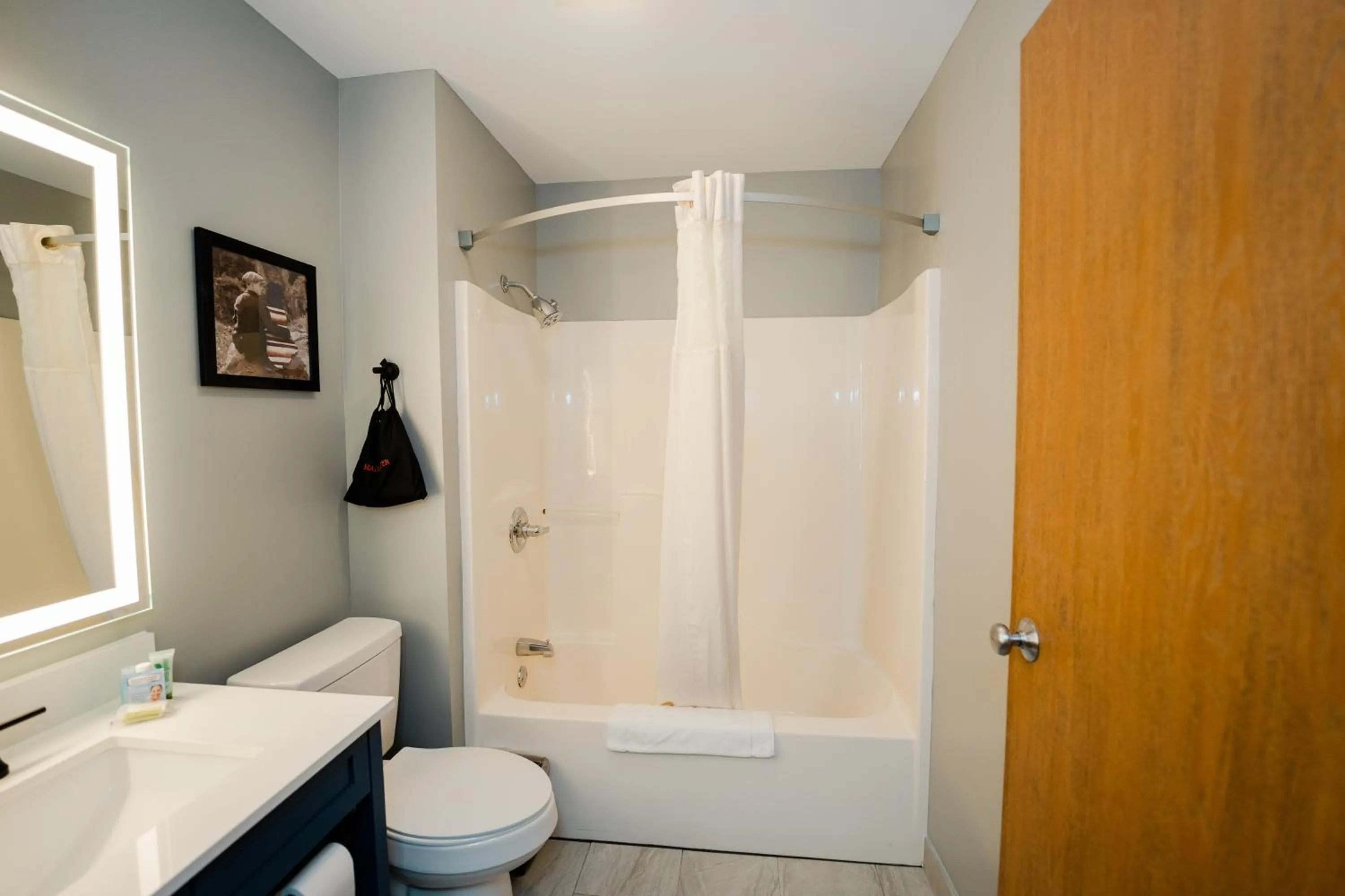 Shower in AmericInn by Wyndham Tomahawk
