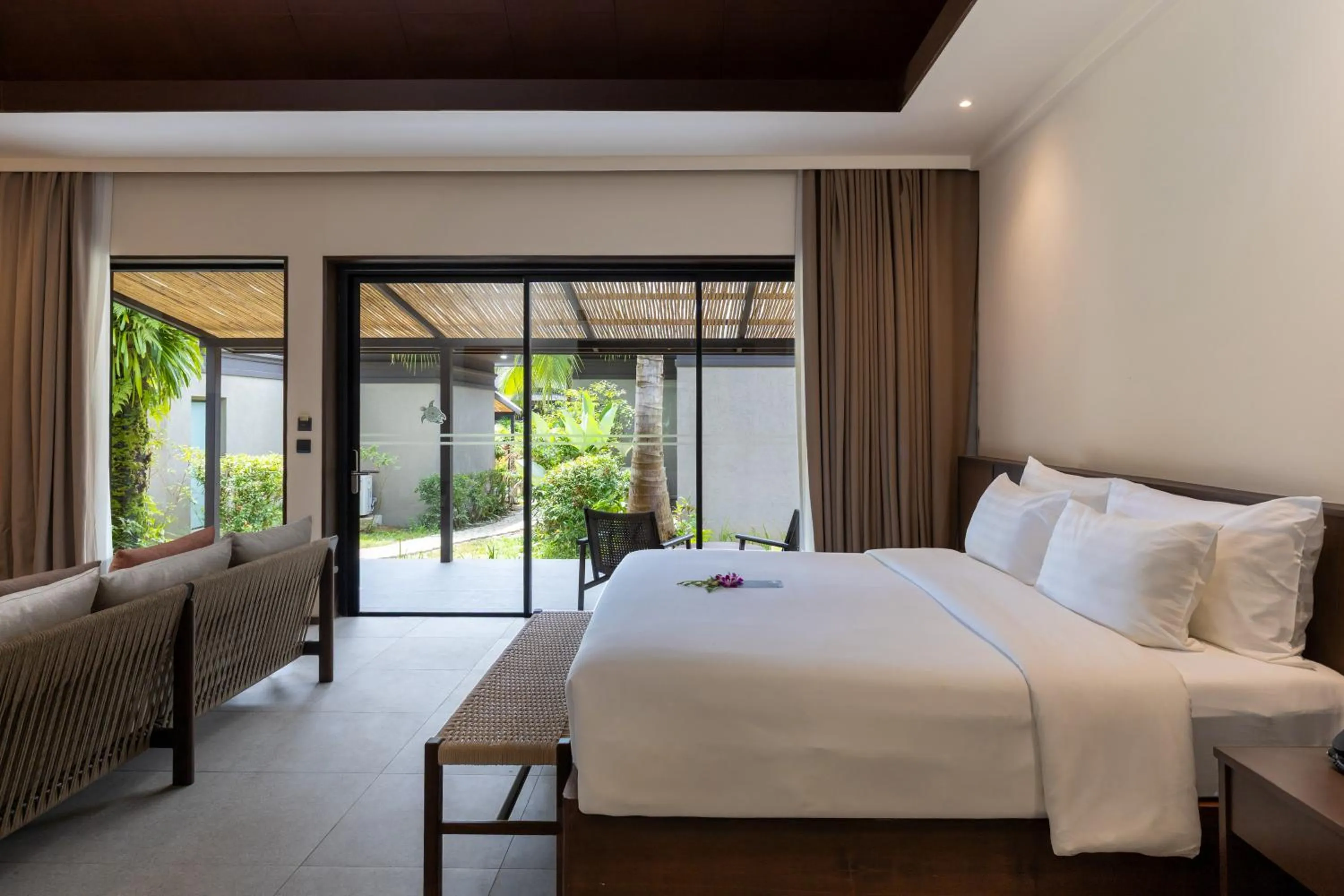 Photo of the whole room, Bed in ananea Beyond Khaolak