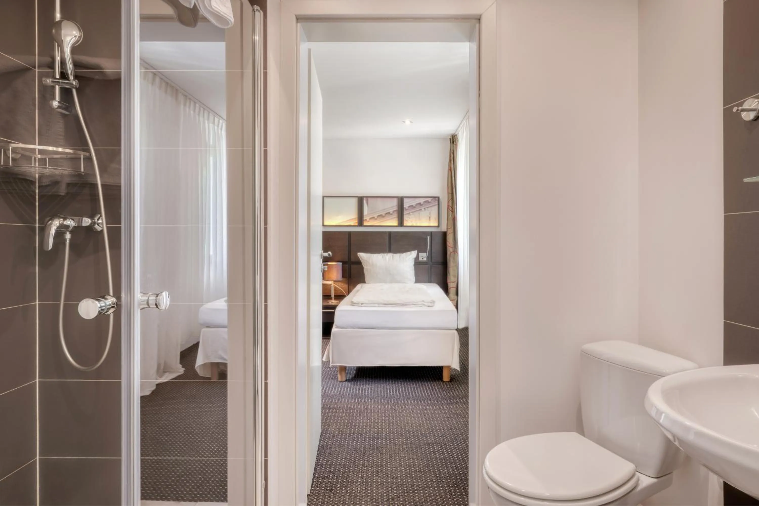 Shower, Bed in Waldhotel