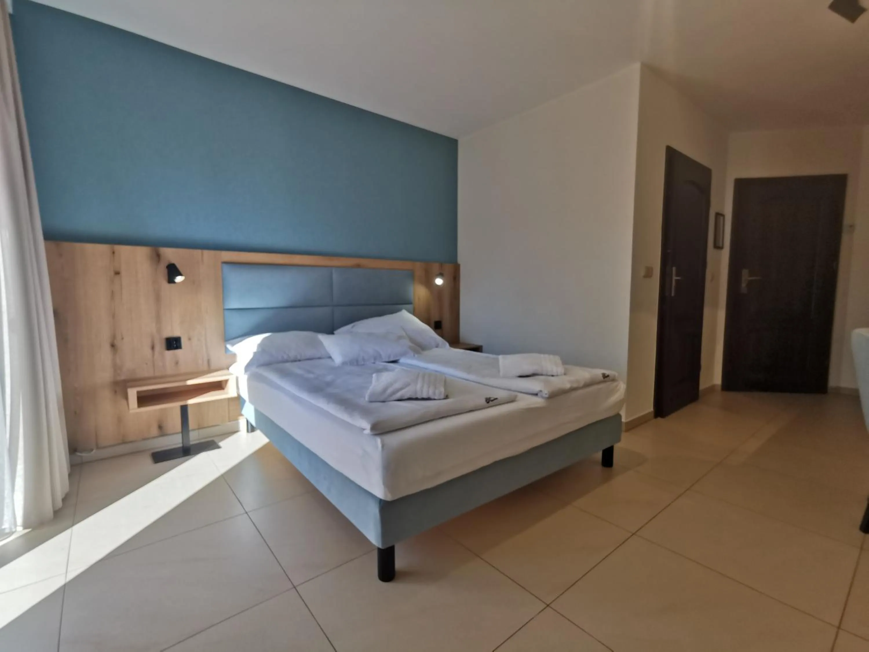 Property building, Bed in Paula Wellness & SPA