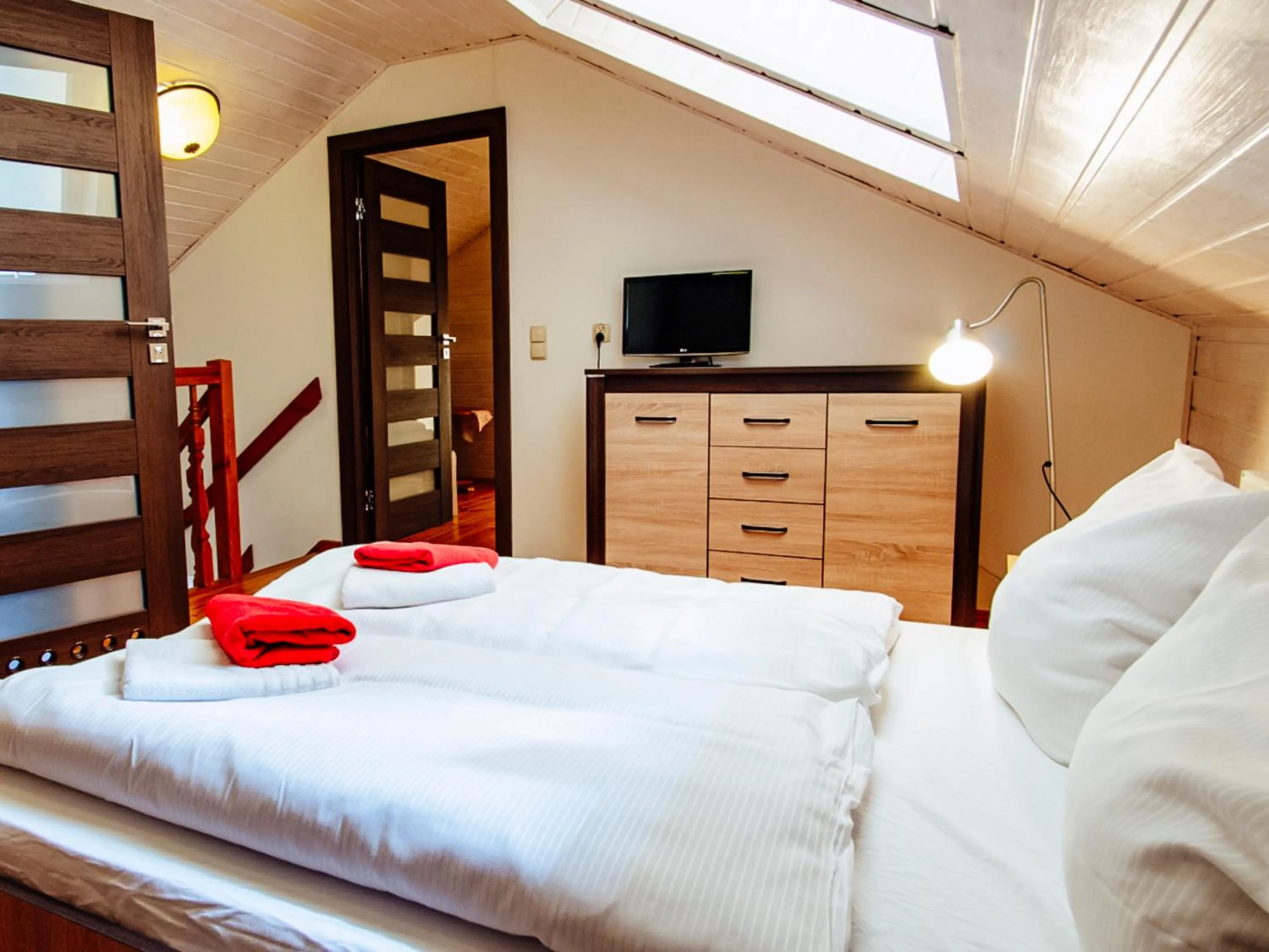 Communal lounge/ TV room, Bed in Paula Wellness & SPA