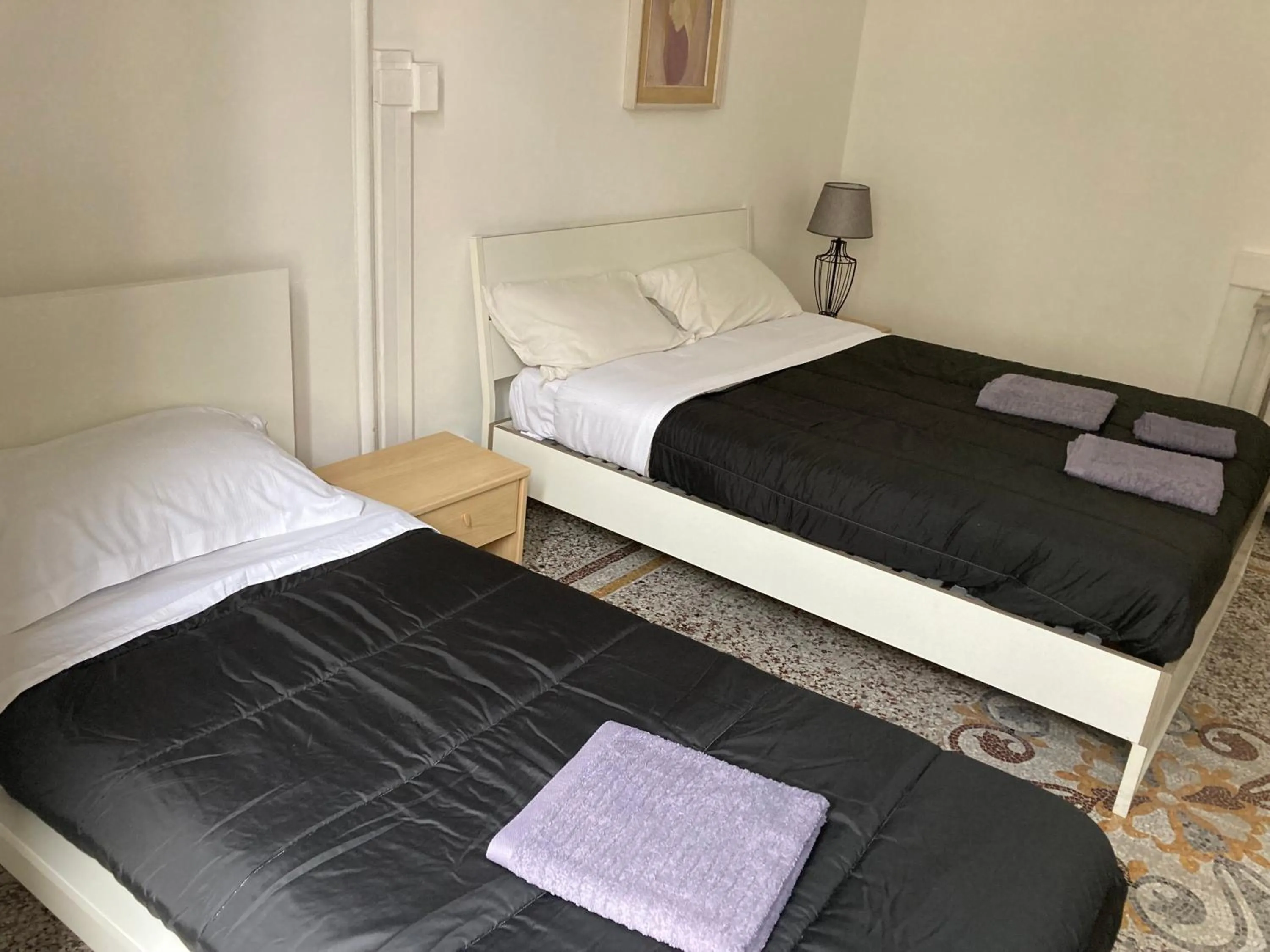 Bed in Guest House Roma