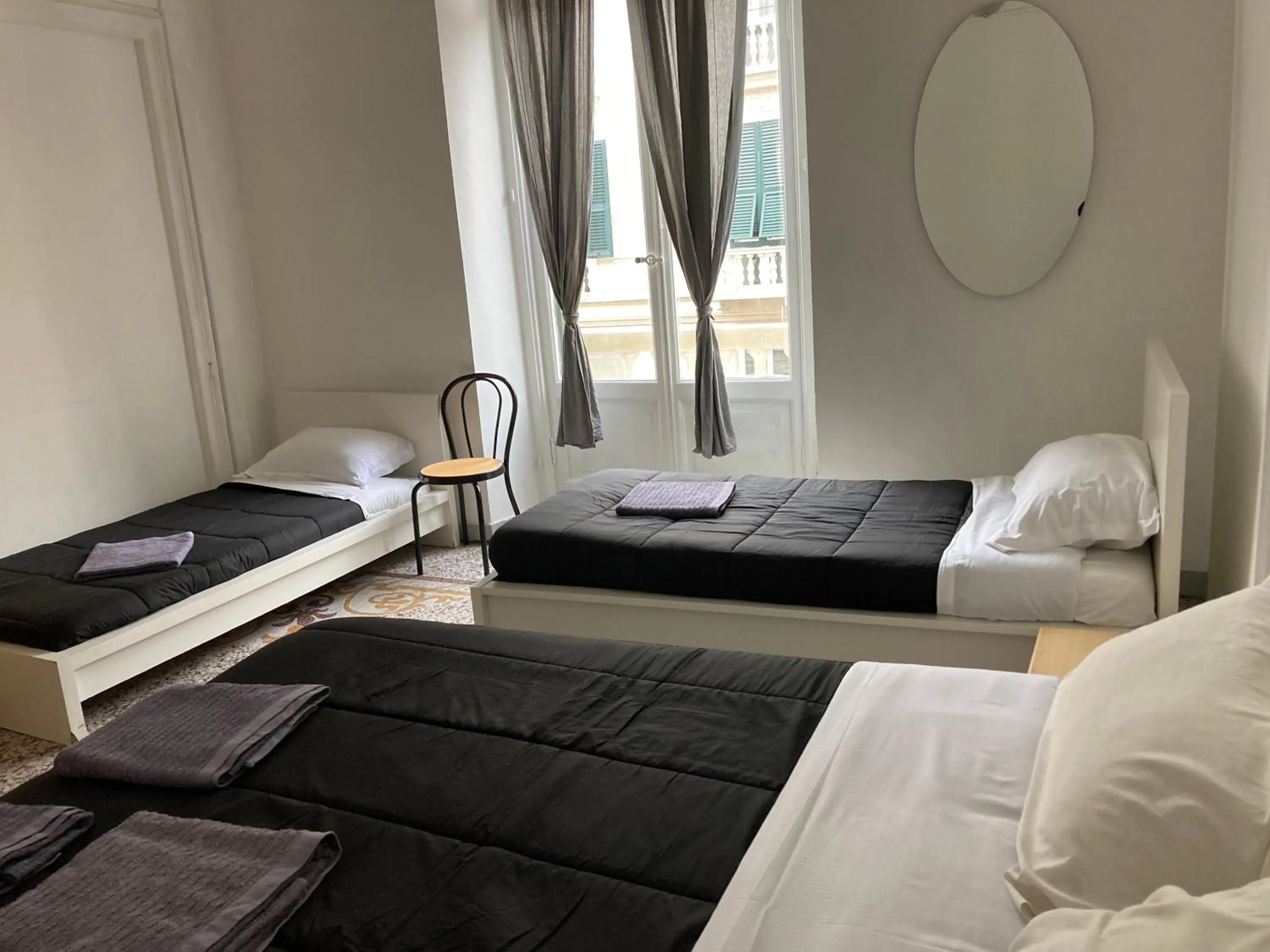 Bed in Guest House Roma