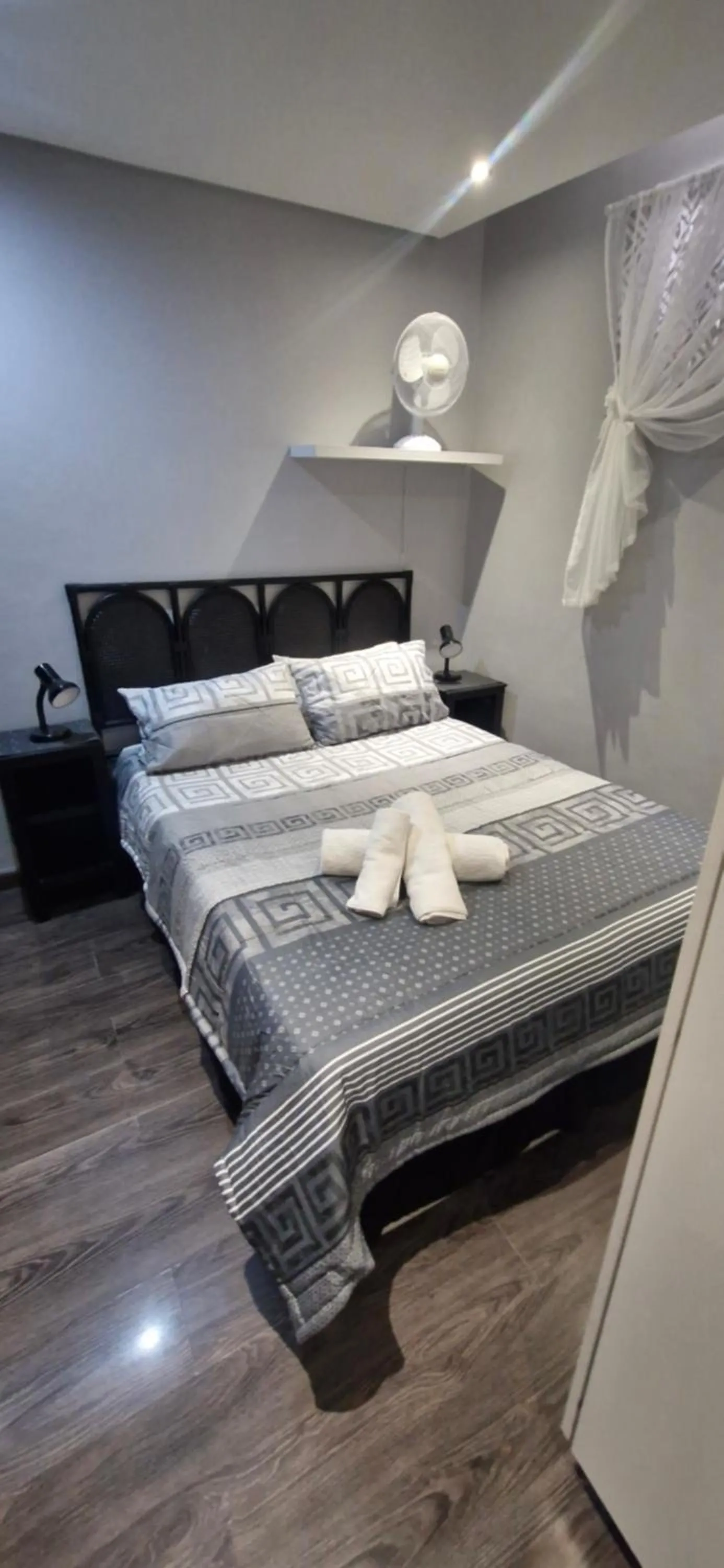 Bed in Elegant Wild Olive Apartment at Grove Mall