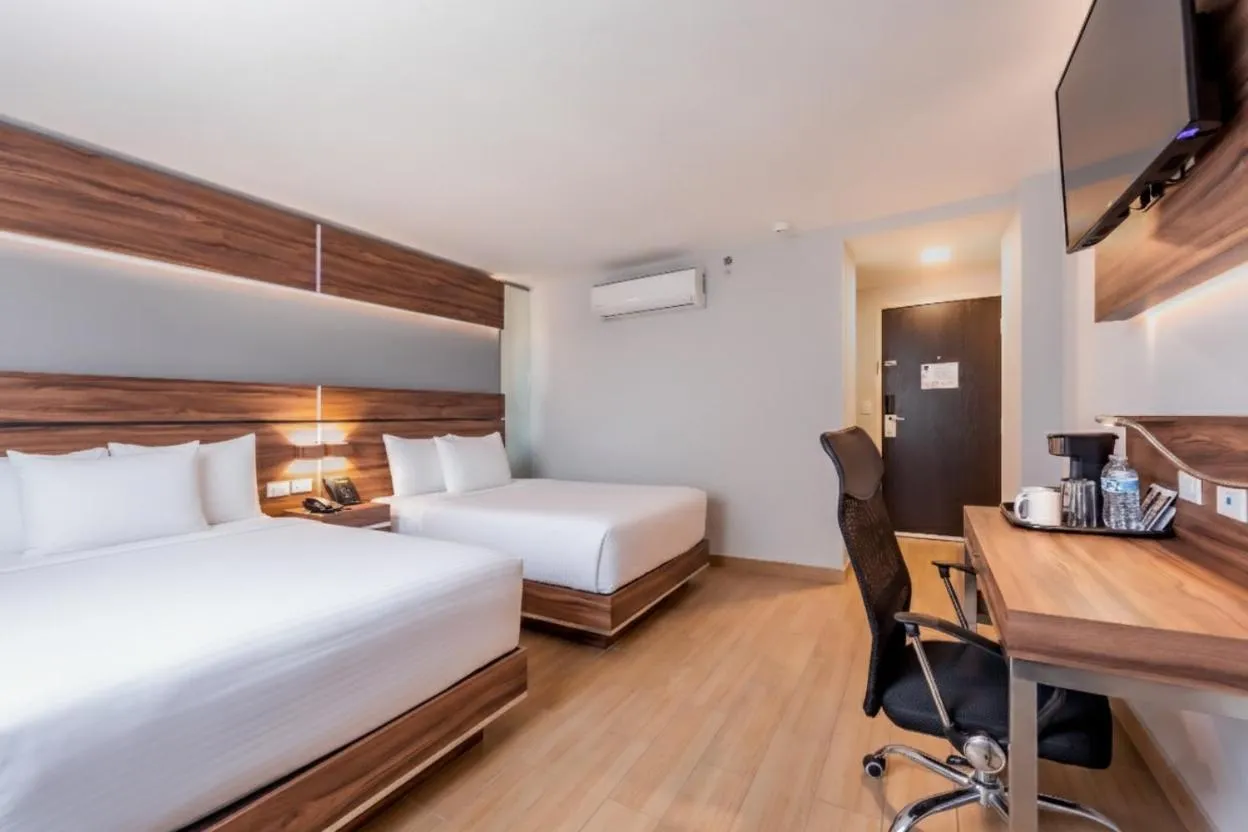 Bedroom, Bed in Sleep Inn Mexicali