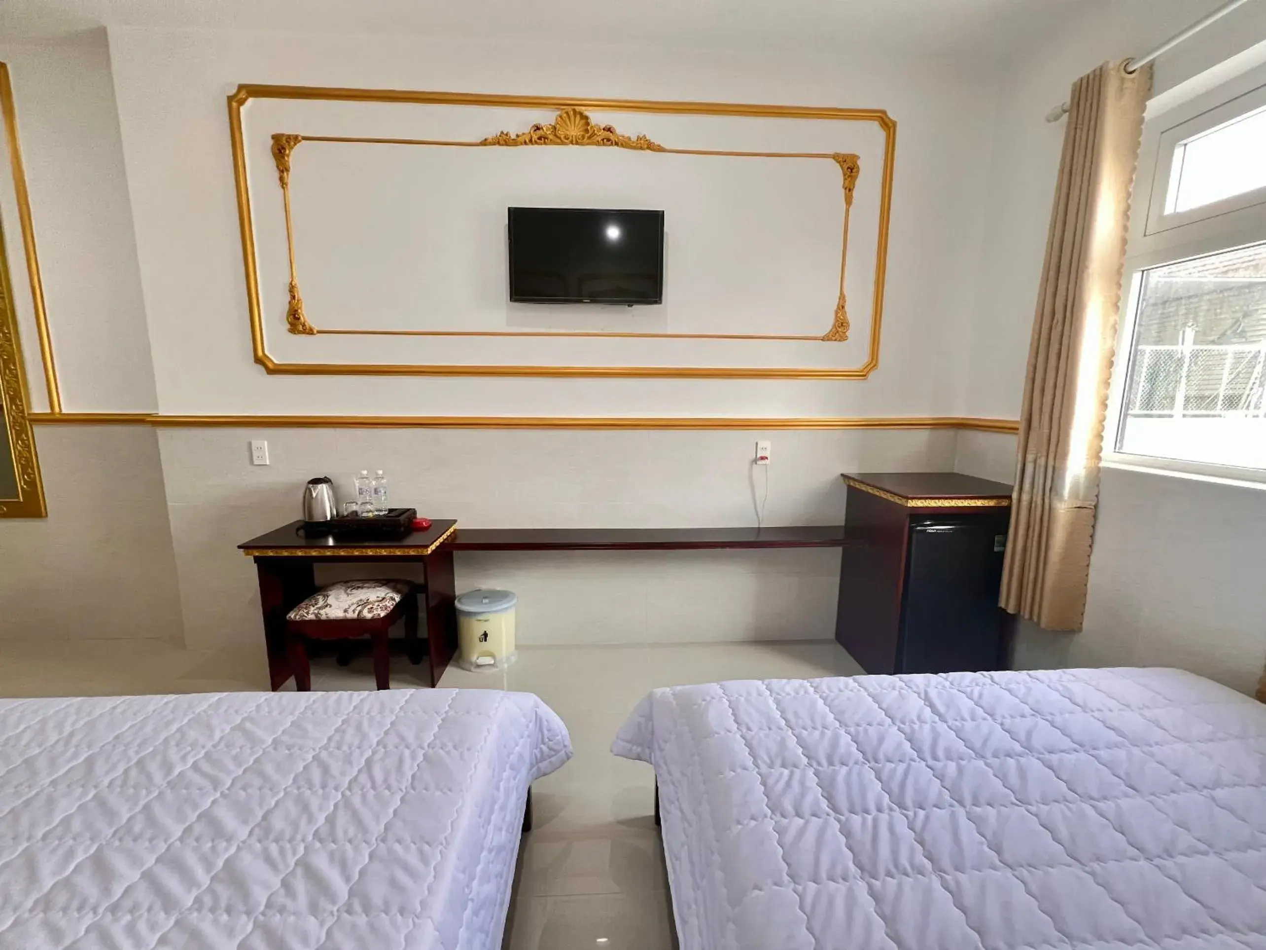 Deluxe Queen Room with Two Queen Beds in King Hotel Quang Ngai Deluxe Queen Room with Two Queen Beds in King Hotel Quang Ngai